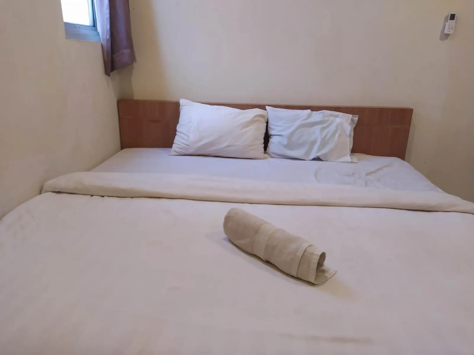 Bed in RedDoorz At Kartini Residence Semarang