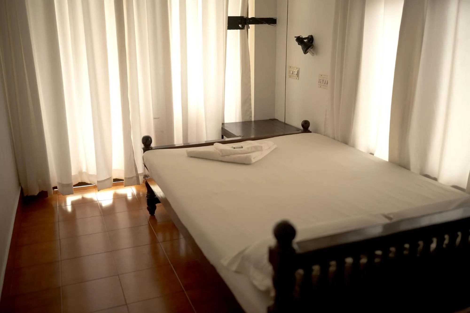 Bed in Vijaya Varma Beach Resort