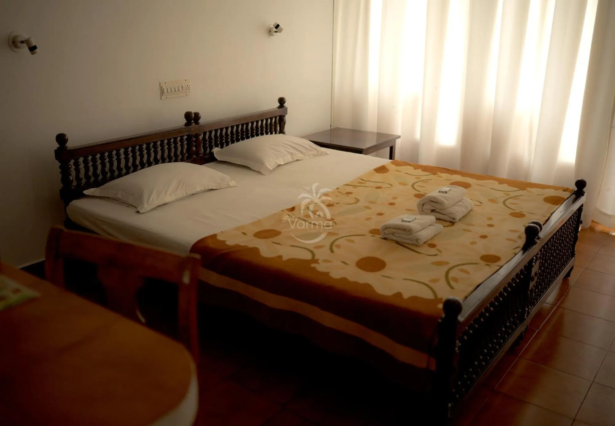 Bed in Vijaya Varma Beach Resort