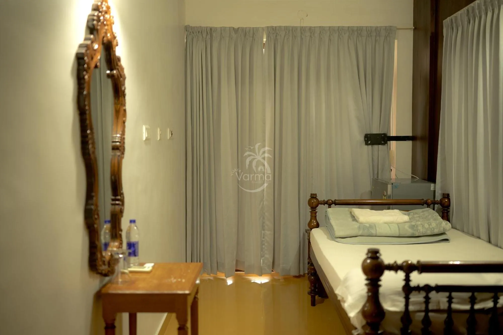 Bed in Vijaya Varma Beach Resort