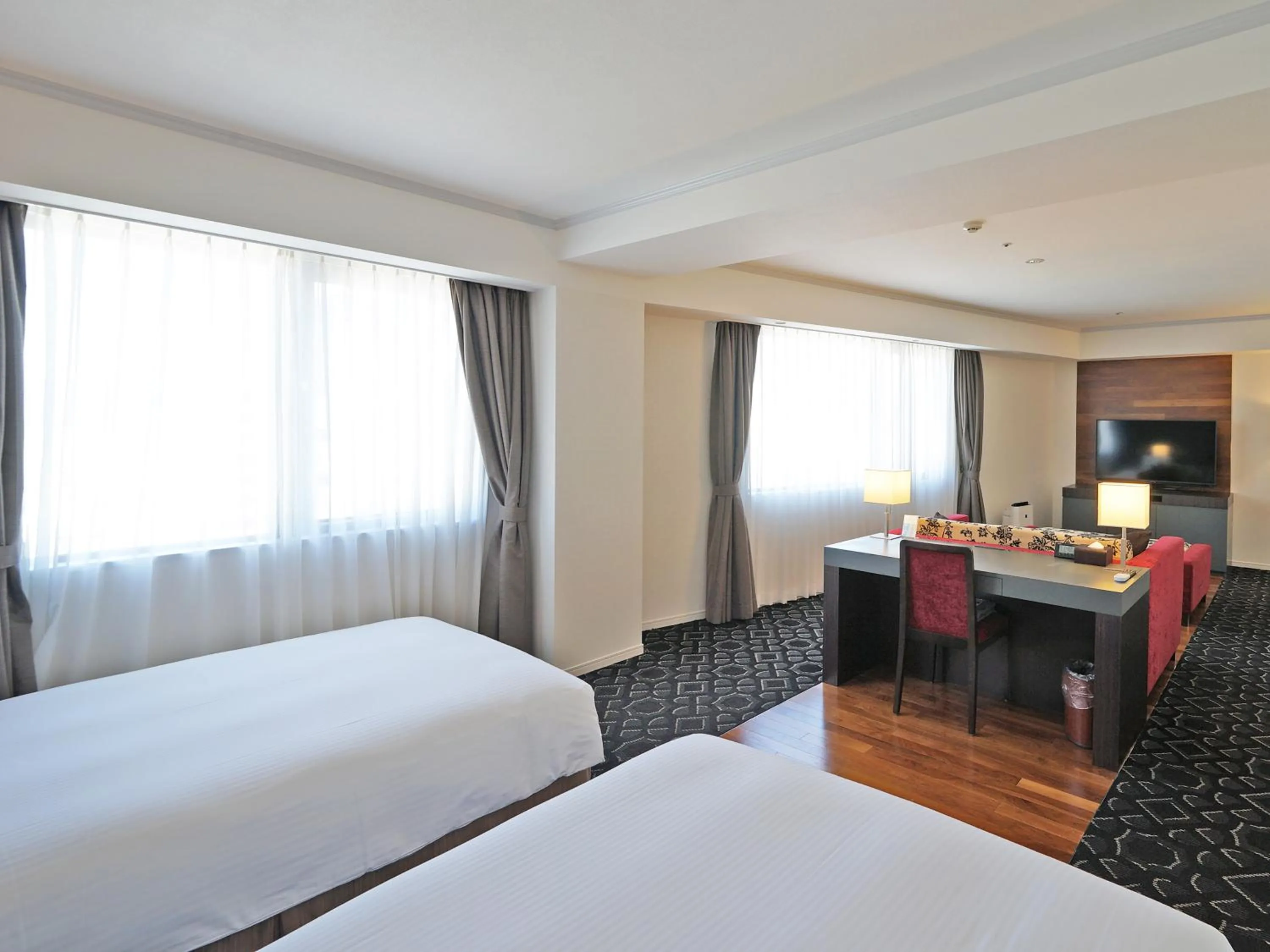 Bed in Chisun Grand Takayama