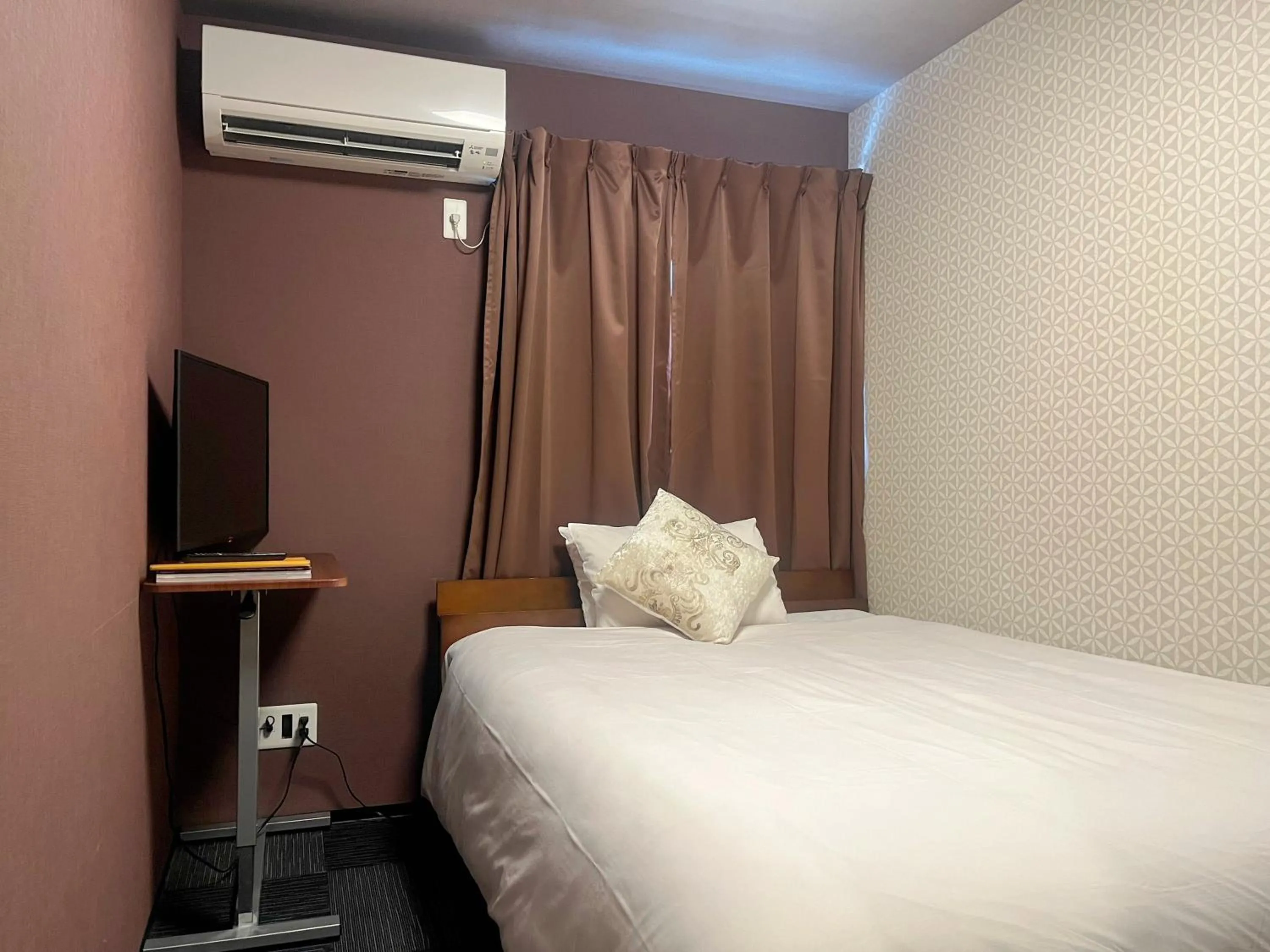 Bed in Miro Kyoto Nijo Hotel