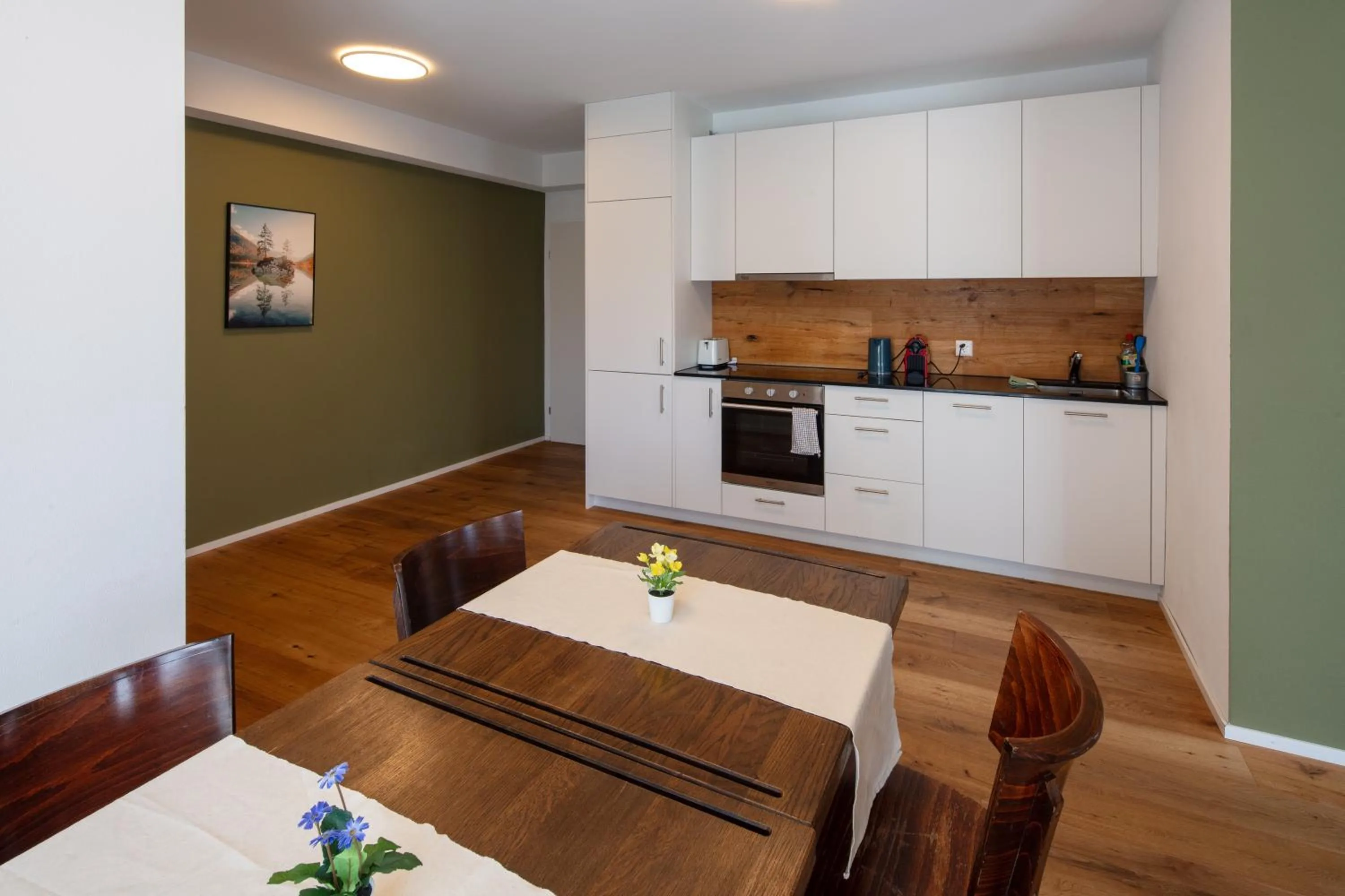 Kitchen or kitchenette in BERG & BERG APARTMENTS - Spiez Self-Check-in
