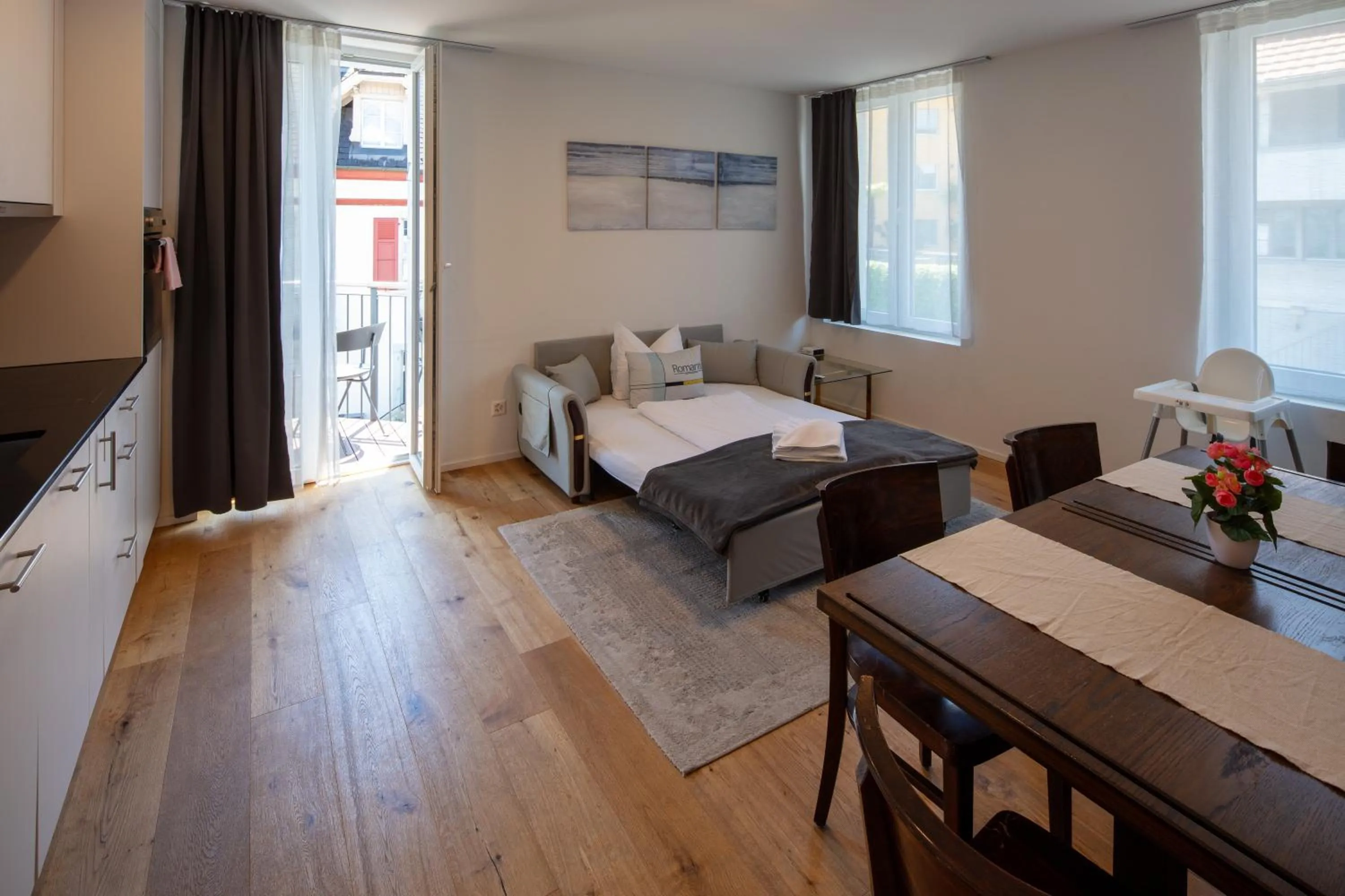 Bed in BERG & BERG APARTMENTS - Spiez Self-Check-in