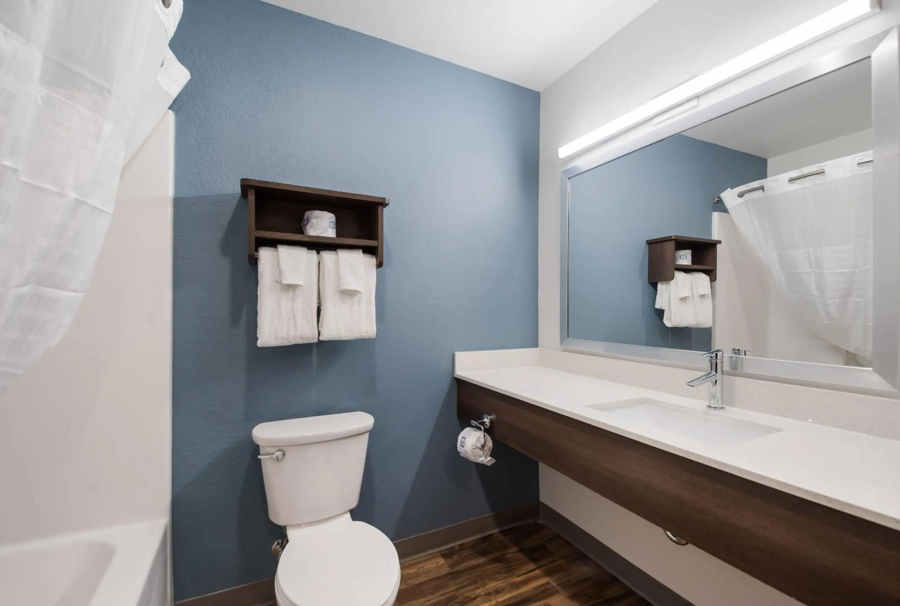 Toilet in WoodSpring Suites Tampa Airport North Veterans Expressway