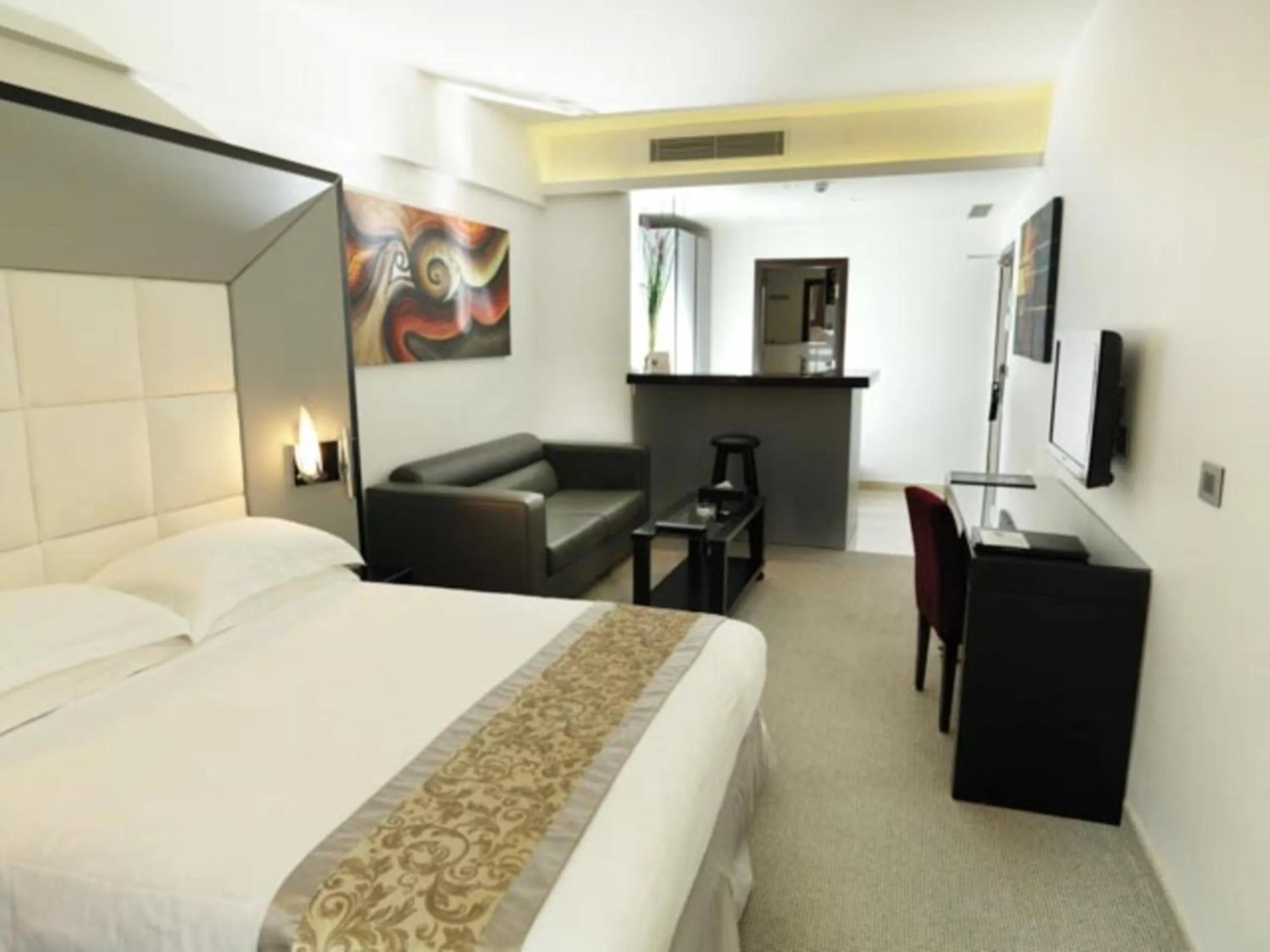 Photo of the whole room, Bed in WH Hotel