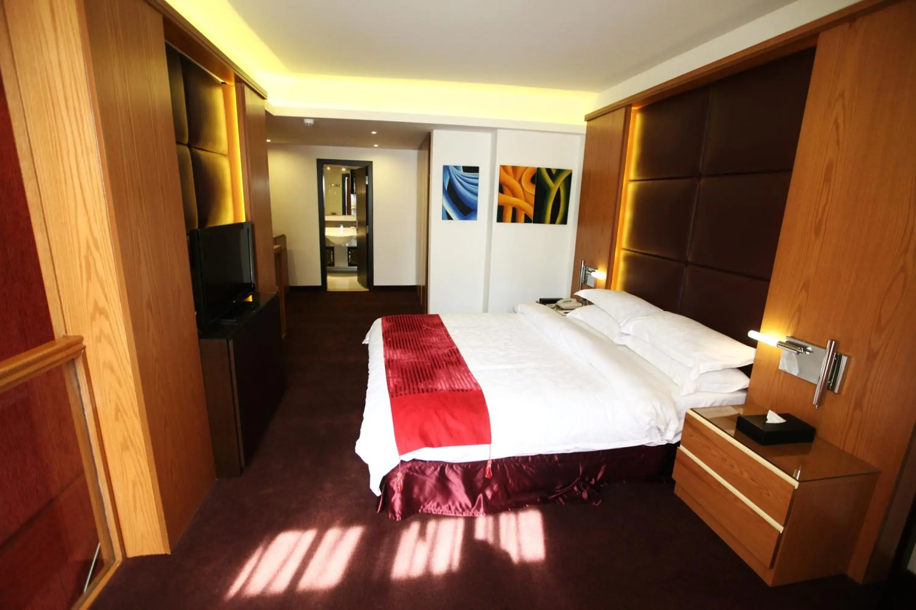 Bed in WH Hotel Bed in WH Hotel