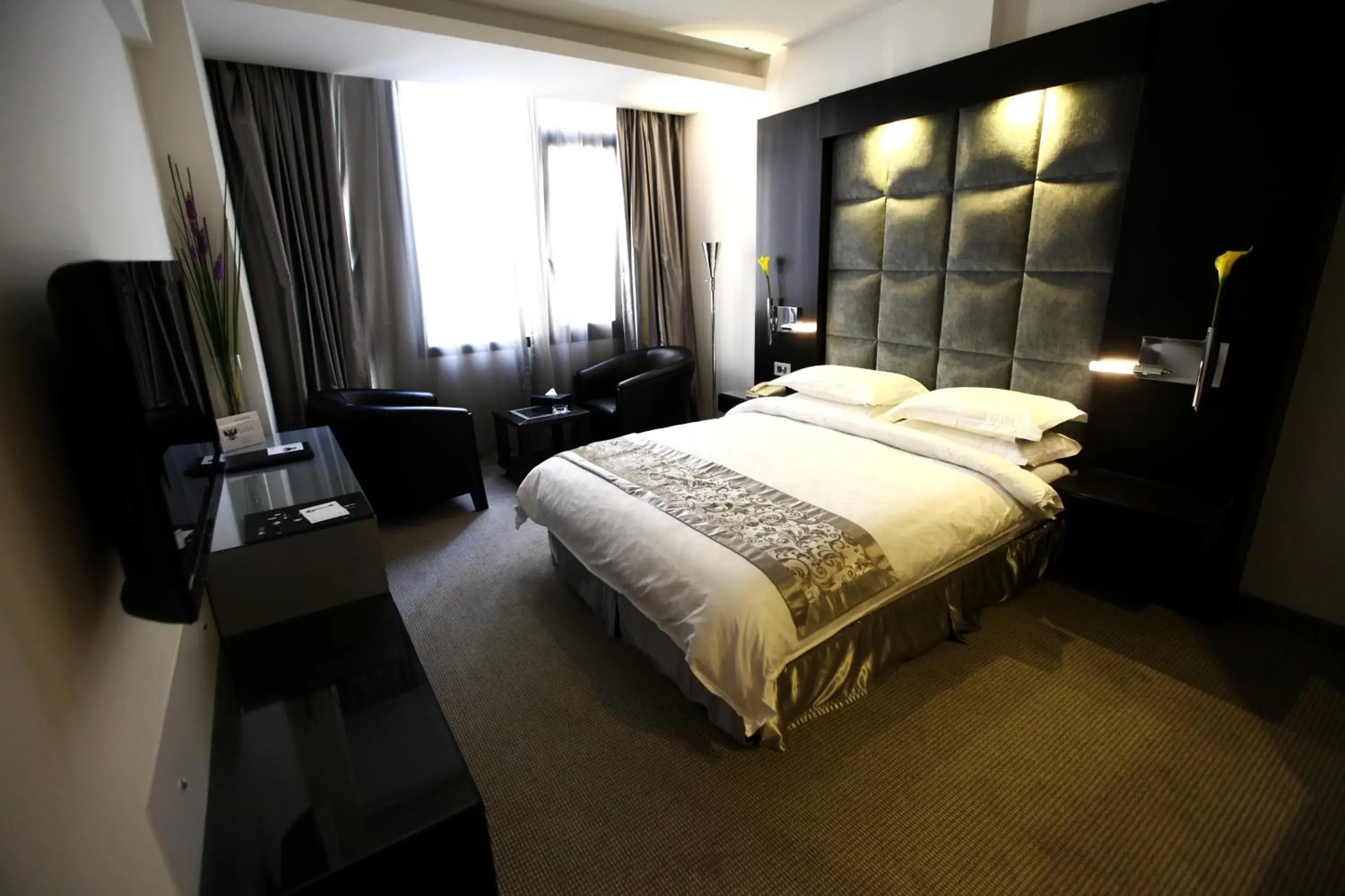 Bed in WH Hotel Bed in WH Hotel