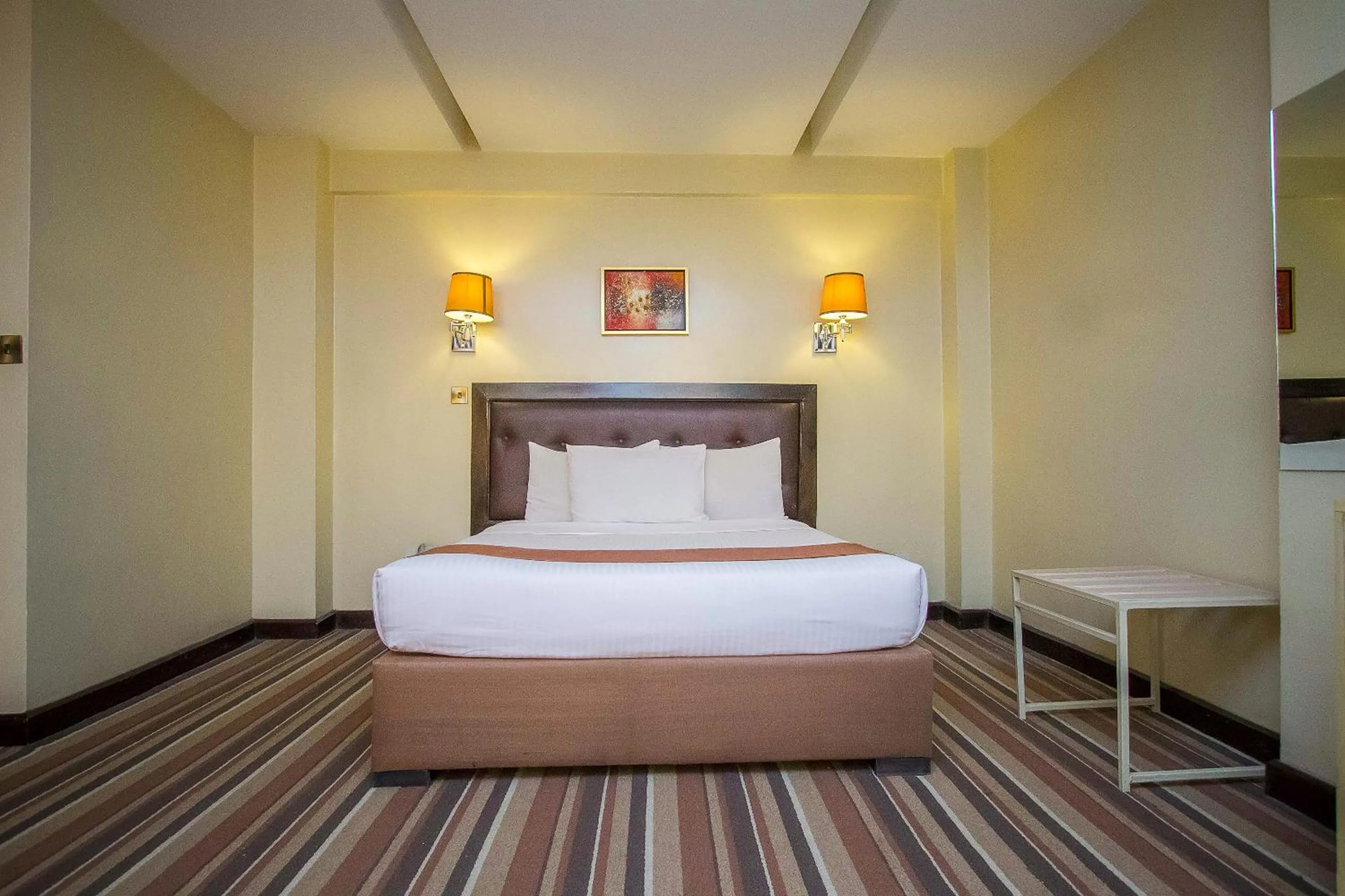 Bed in The Clarion Hotel