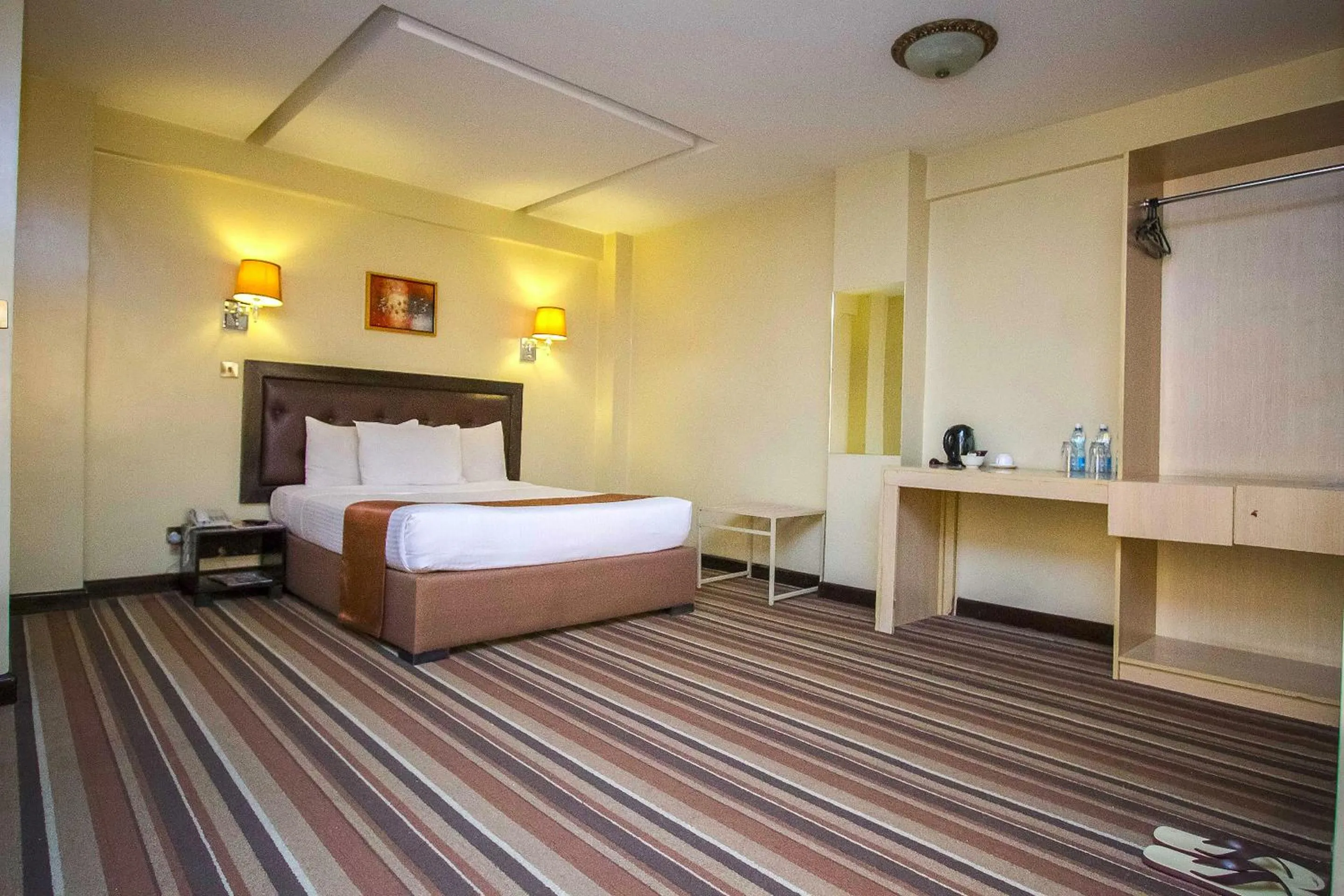 Bed in The Clarion Hotel