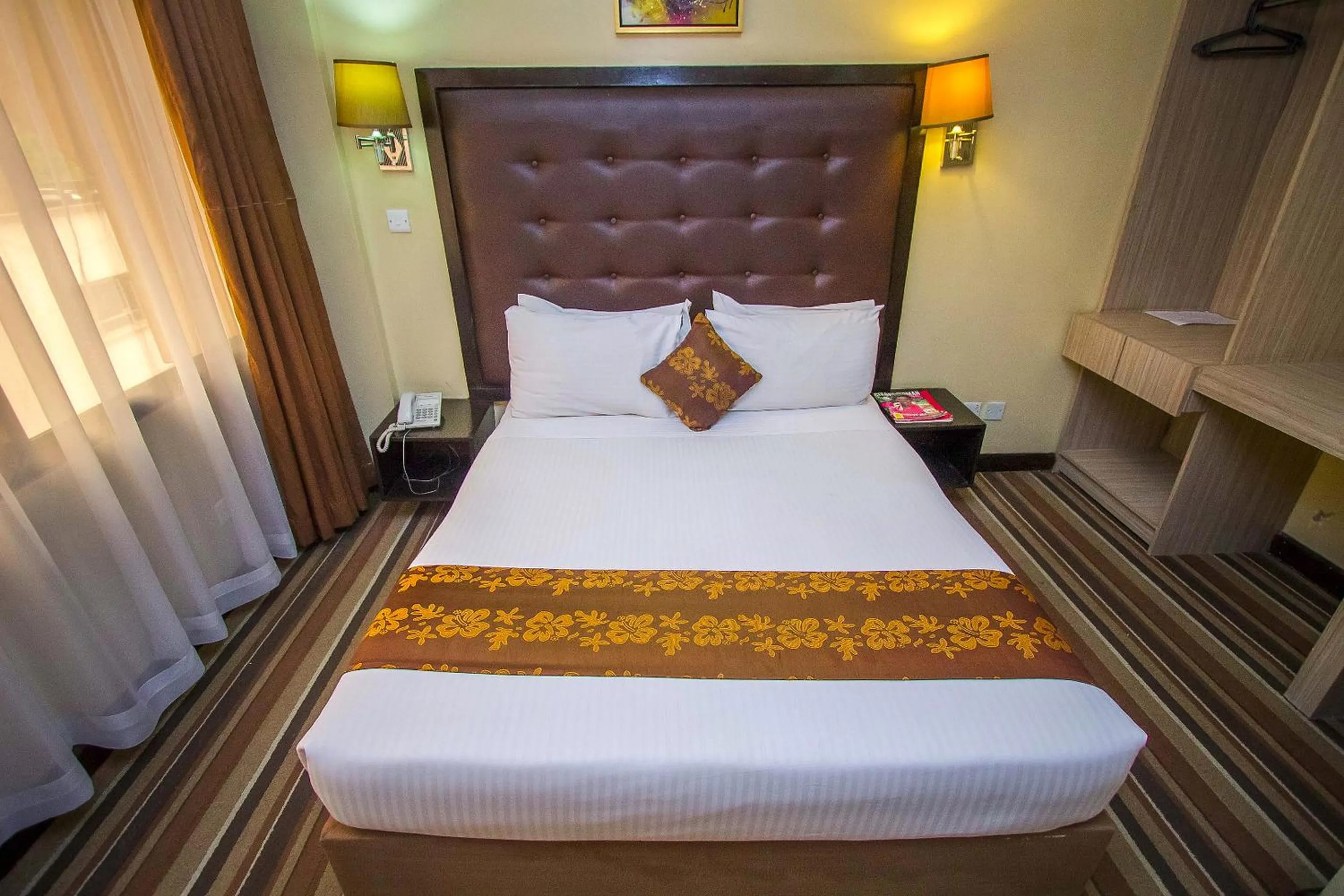 Bed in The Clarion Hotel