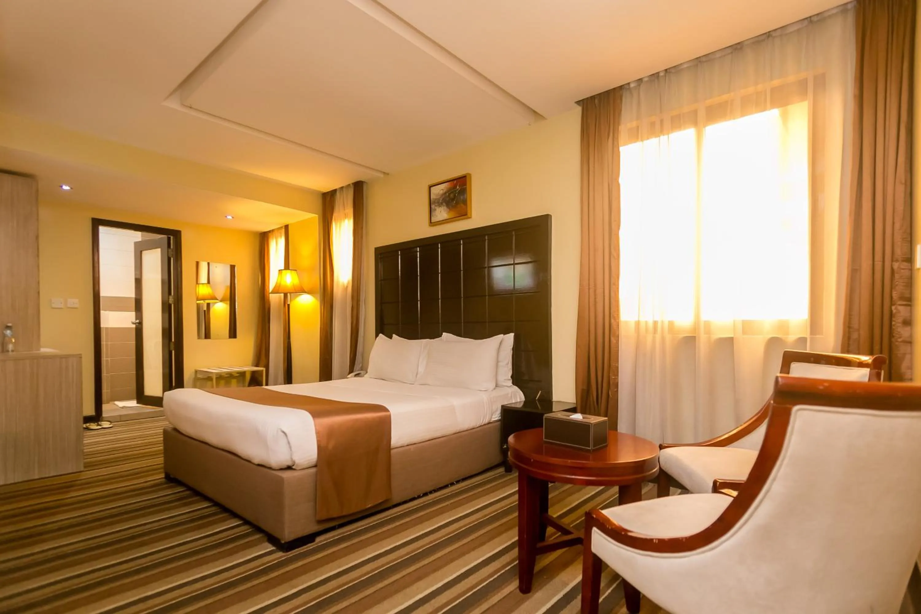 Bedroom, Bed in The Clarion Hotel