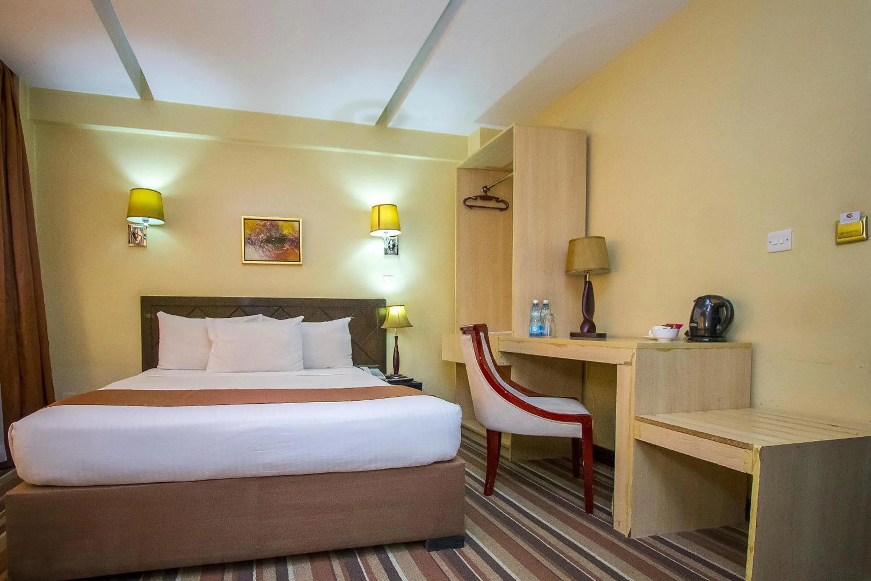 Bed in The Clarion Hotel