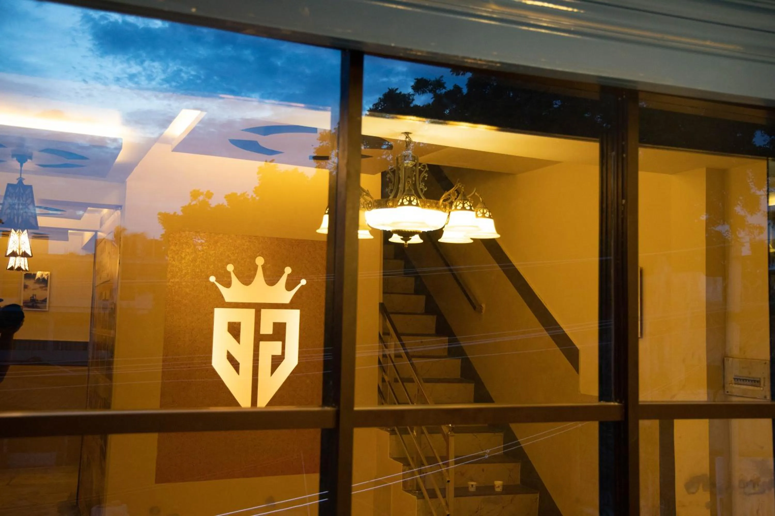 Property logo or sign in Hotel Ganesh Palace