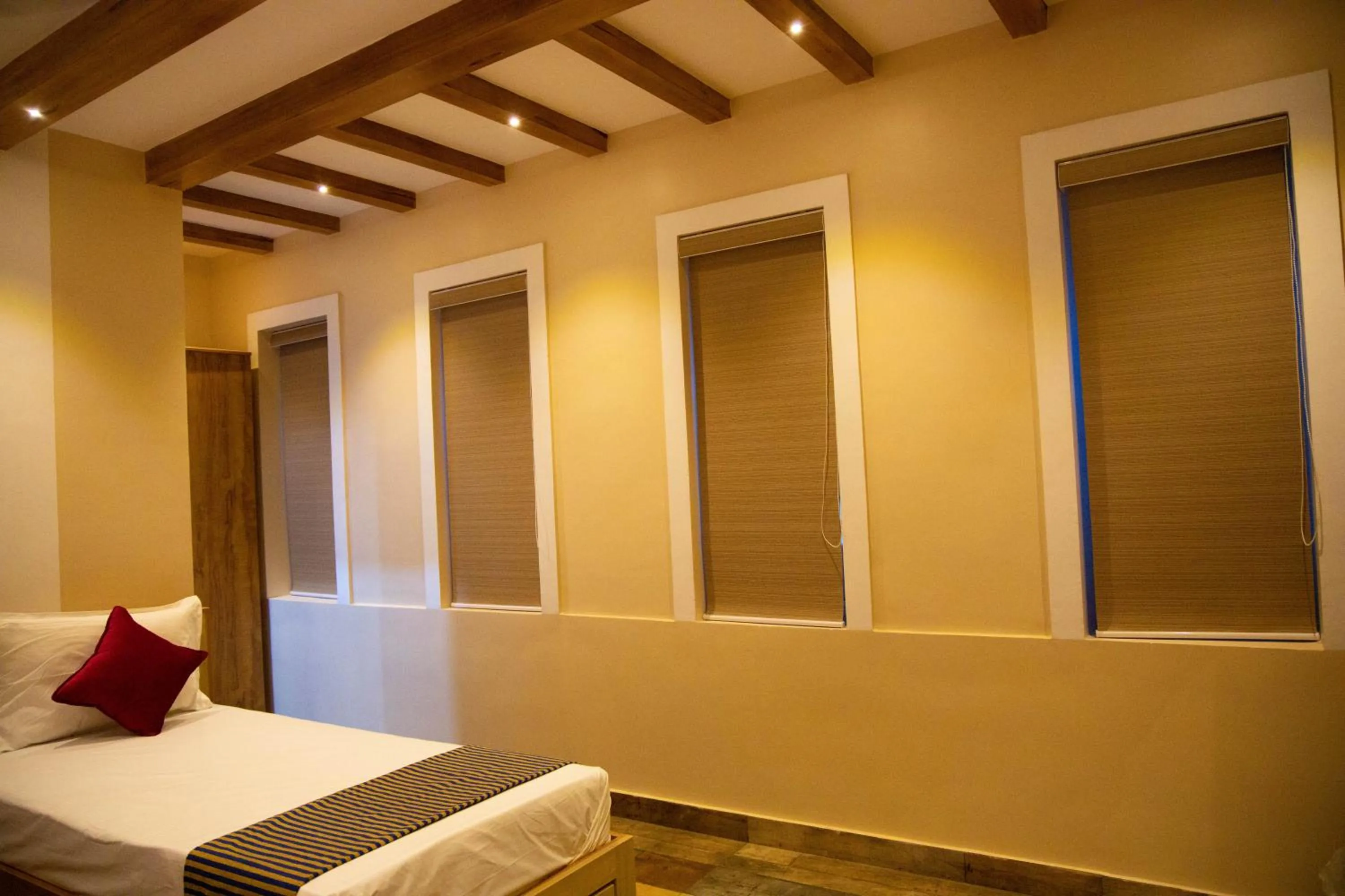 Bed in Hotel Ganesh Palace