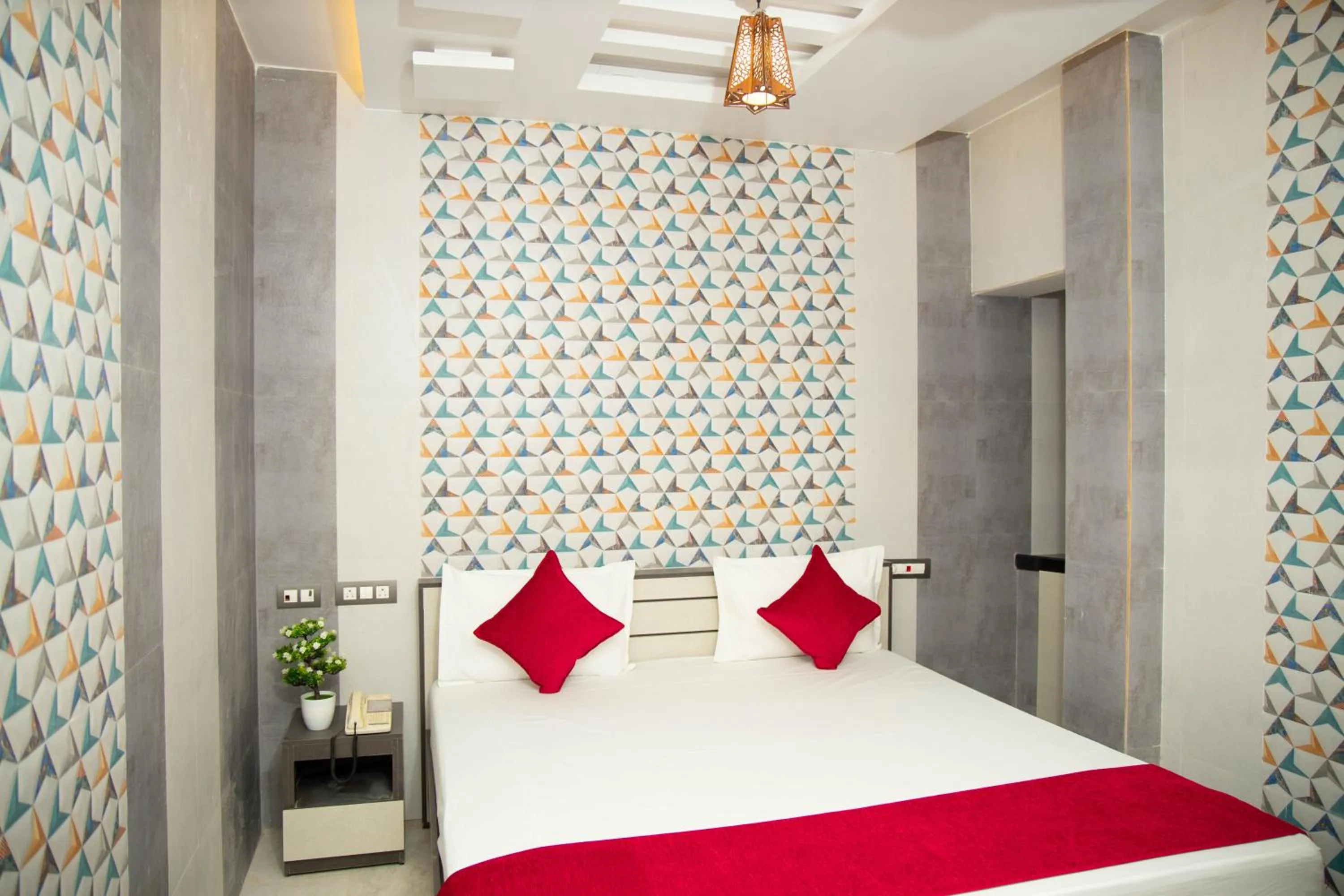 Bed in Hotel Ganesh Palace