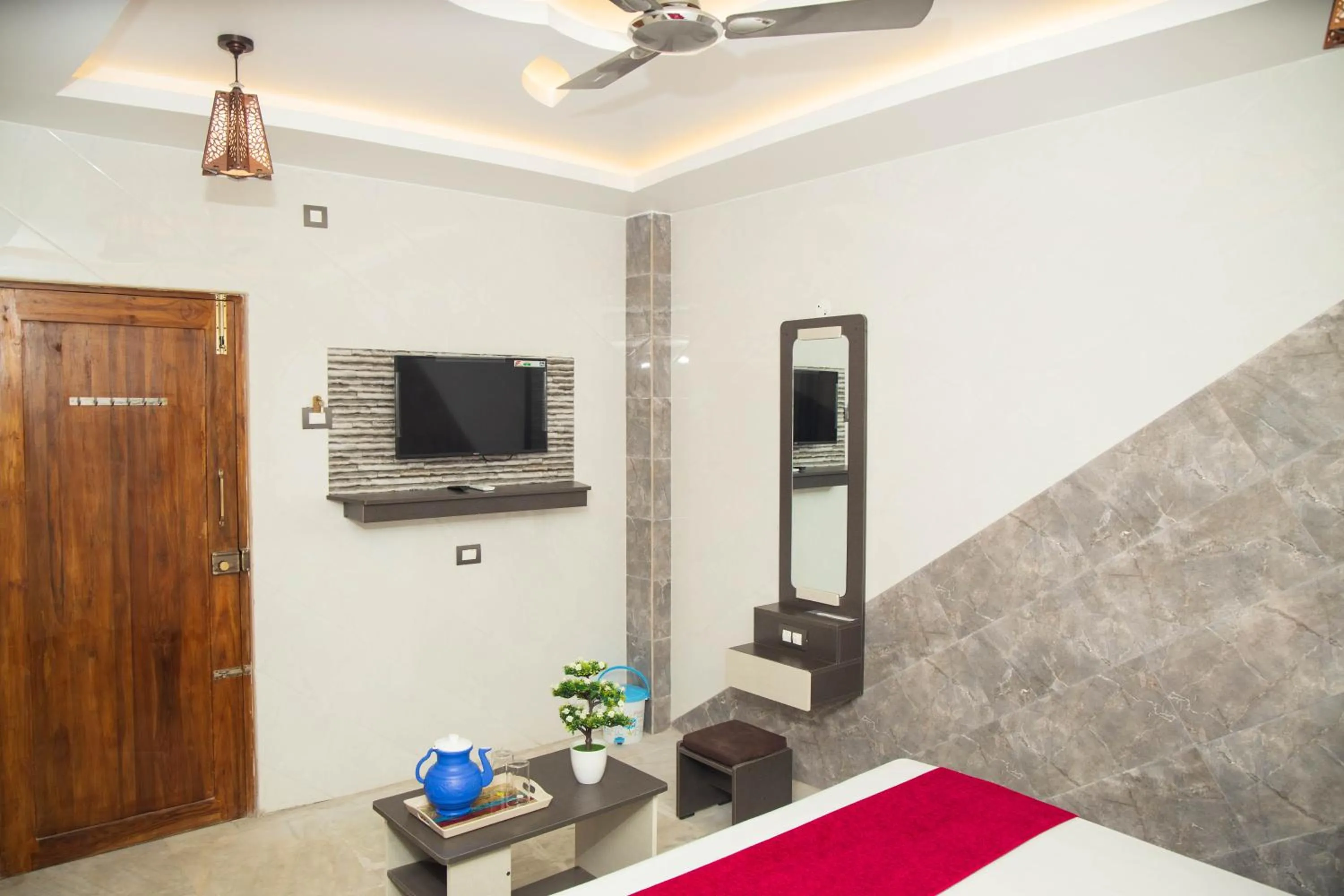 Communal lounge/ TV room in Hotel Ganesh Palace