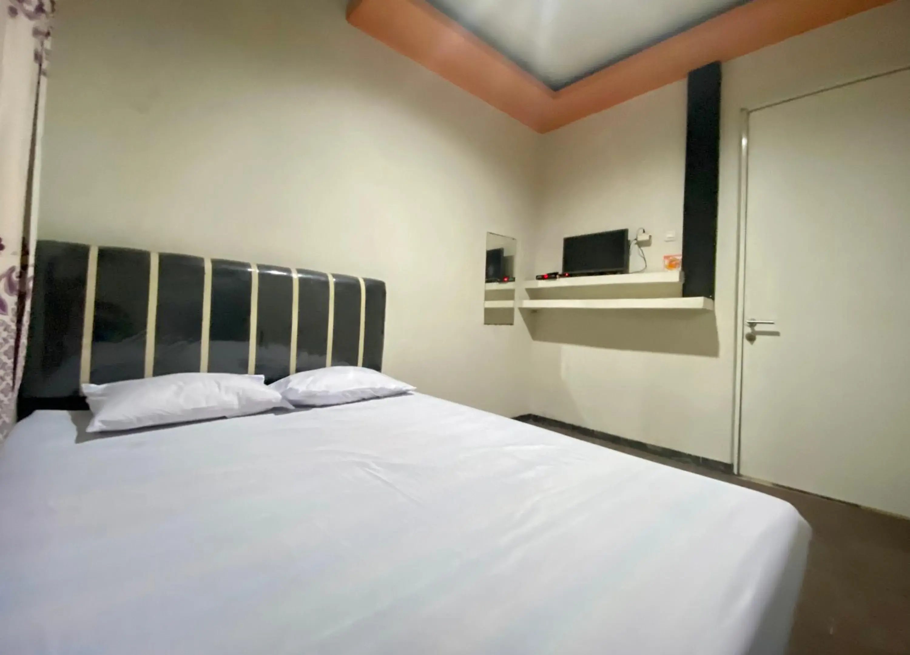 Bed in Homestay Srikandi Syariah Dieng RedPartner Bed in Homestay Srikandi Syariah Dieng RedPartner