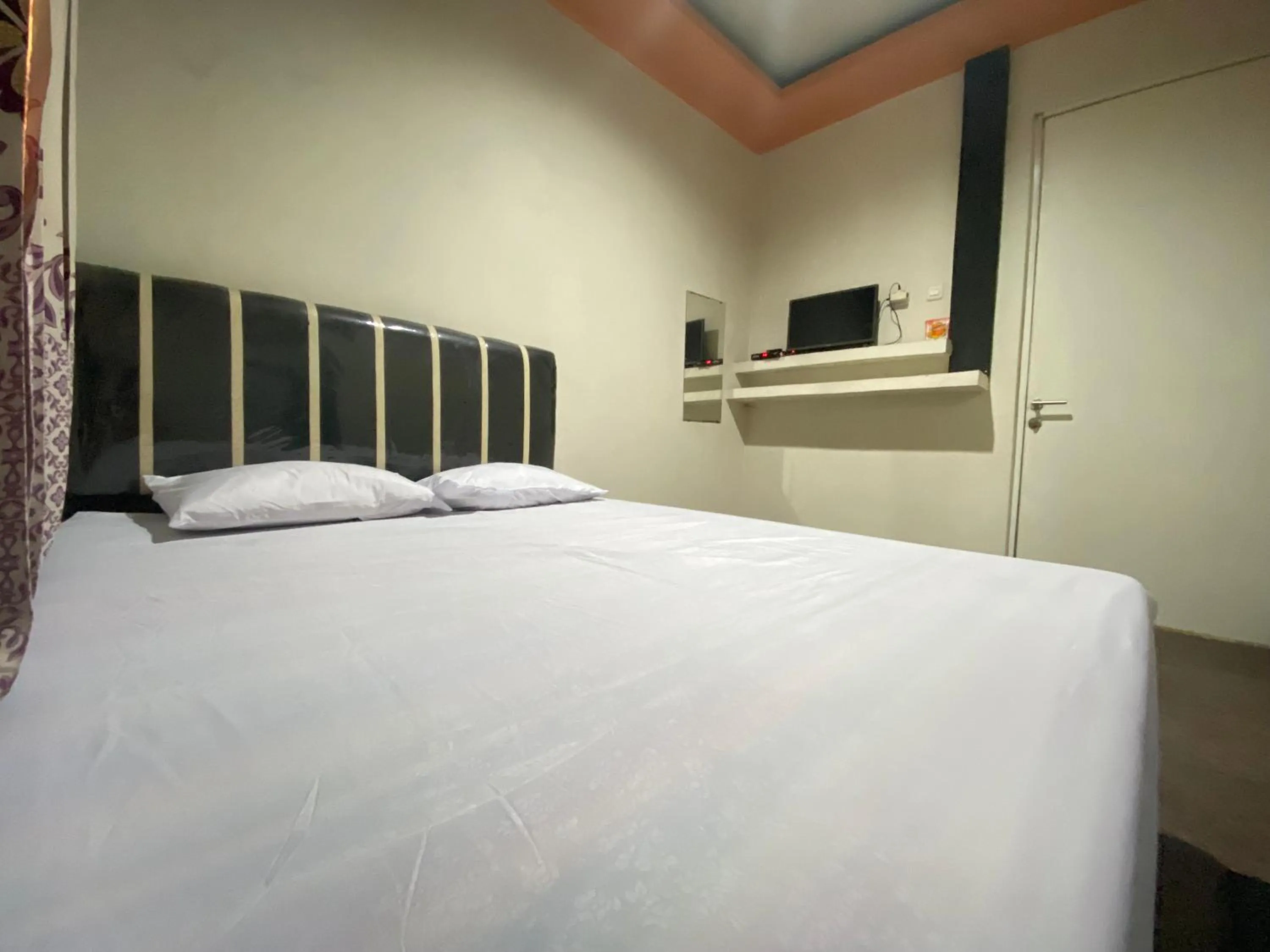 Bed in Homestay Srikandi Syariah Dieng RedPartner