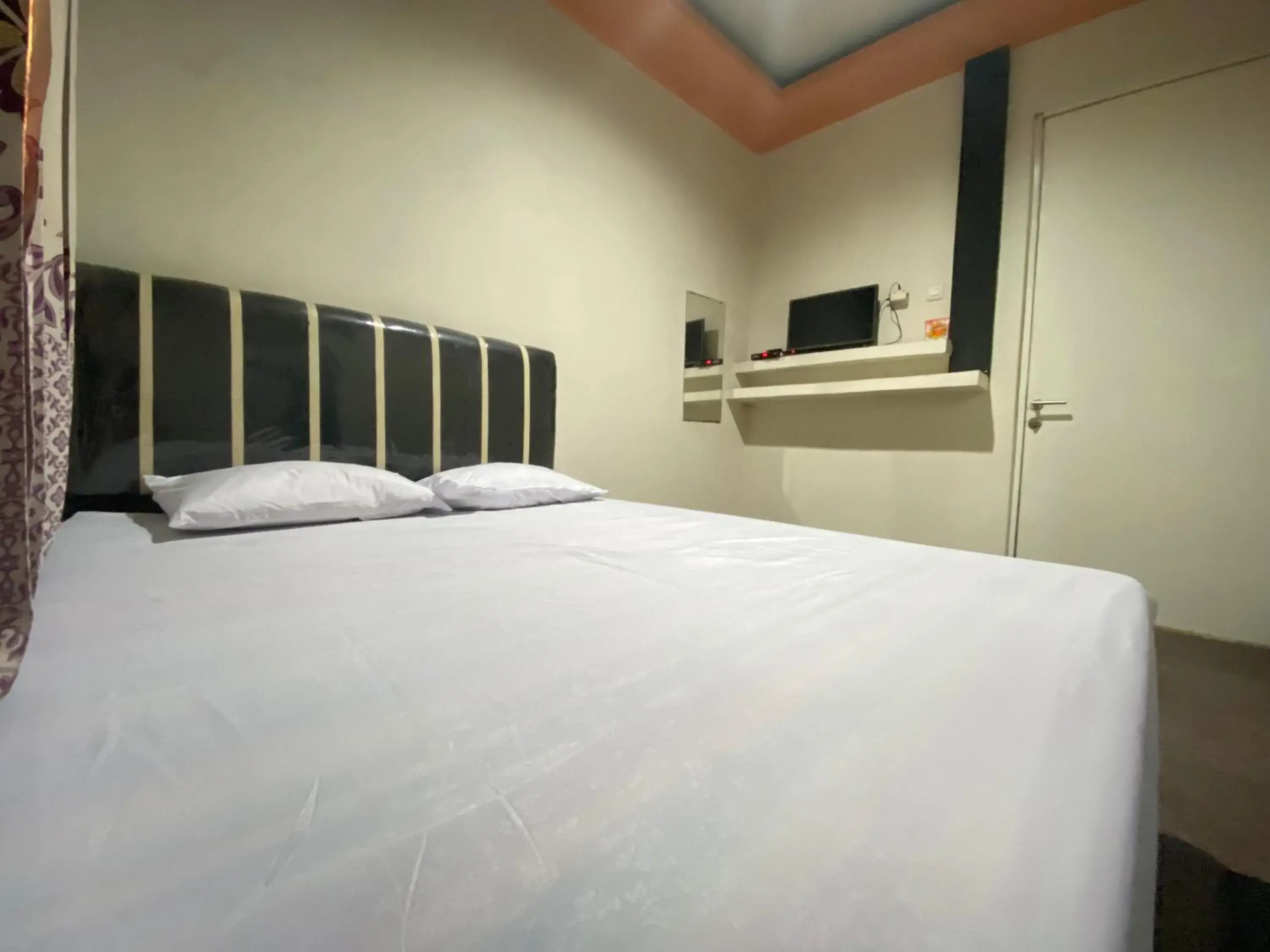 Bed in Homestay Srikandi Syariah Dieng RedPartner Bed in Homestay Srikandi Syariah Dieng RedPartner