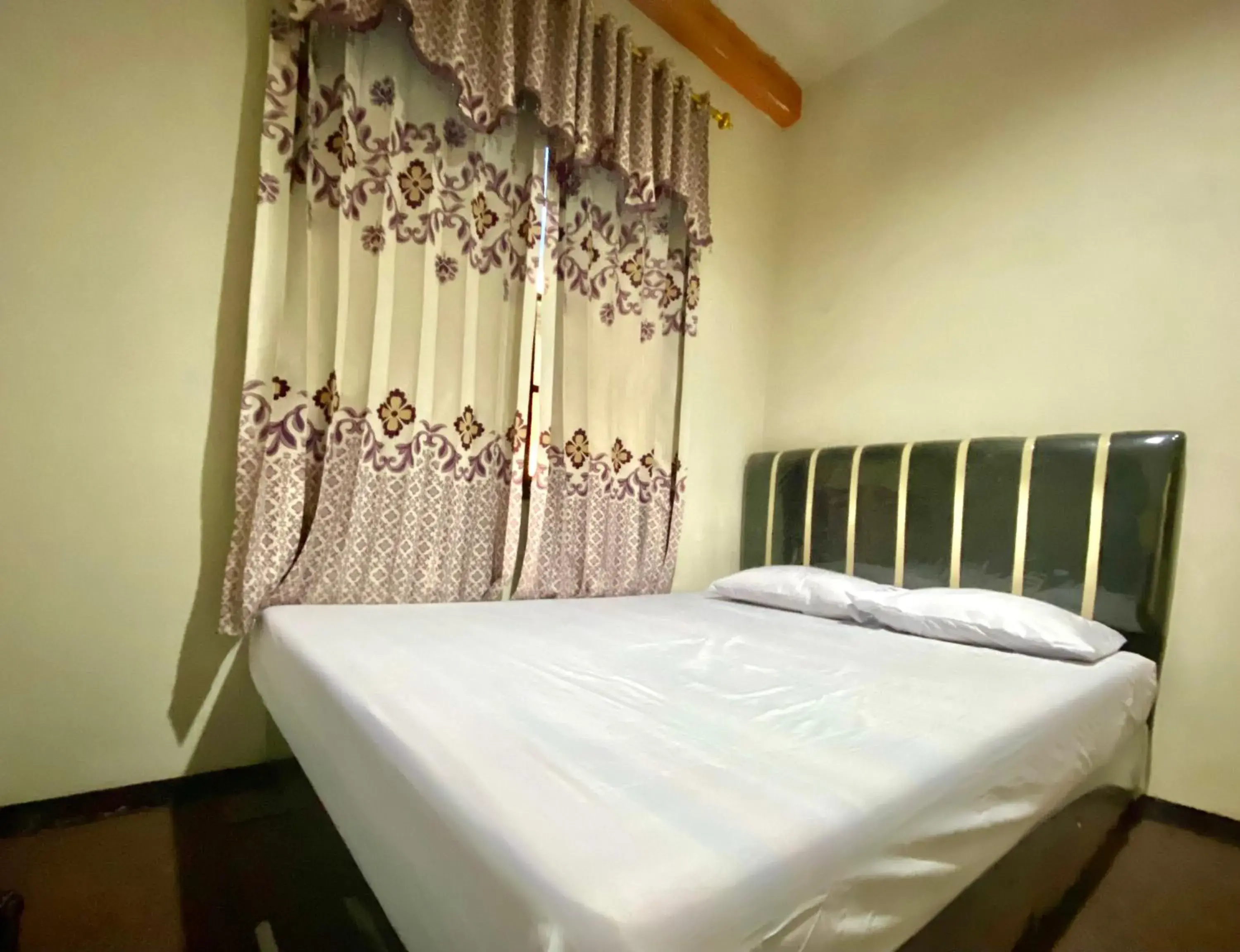 Bed in Homestay Srikandi Syariah Dieng RedPartner Bed in Homestay Srikandi Syariah Dieng RedPartner