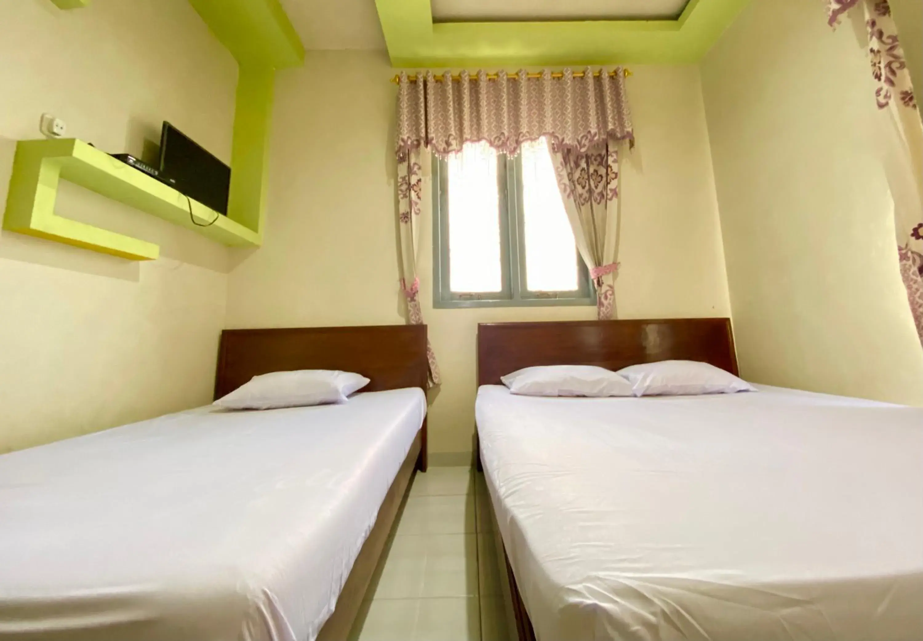 Bed in Homestay Srikandi Syariah Dieng RedPartner Bed in Homestay Srikandi Syariah Dieng RedPartner