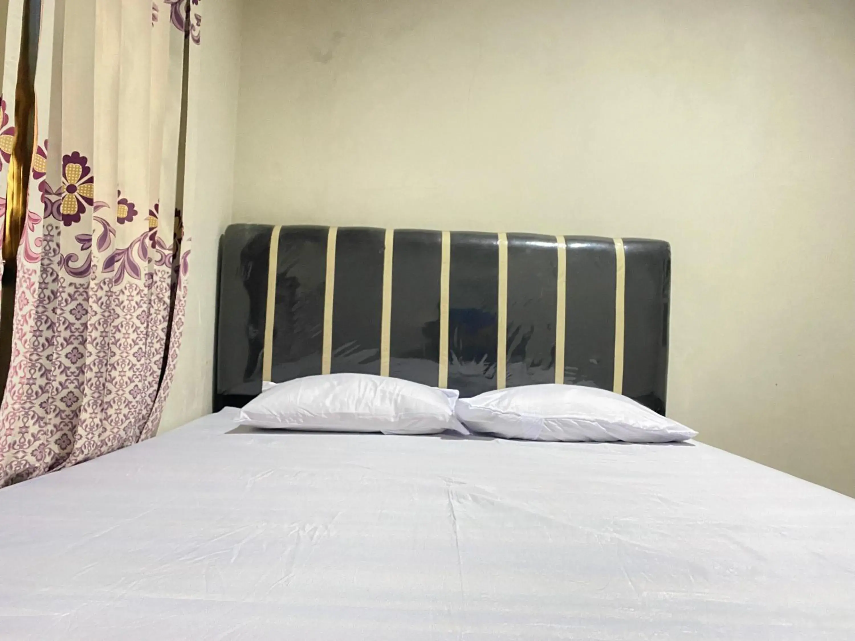 Bed in Homestay Srikandi Syariah Dieng RedPartner Bed in Homestay Srikandi Syariah Dieng RedPartner