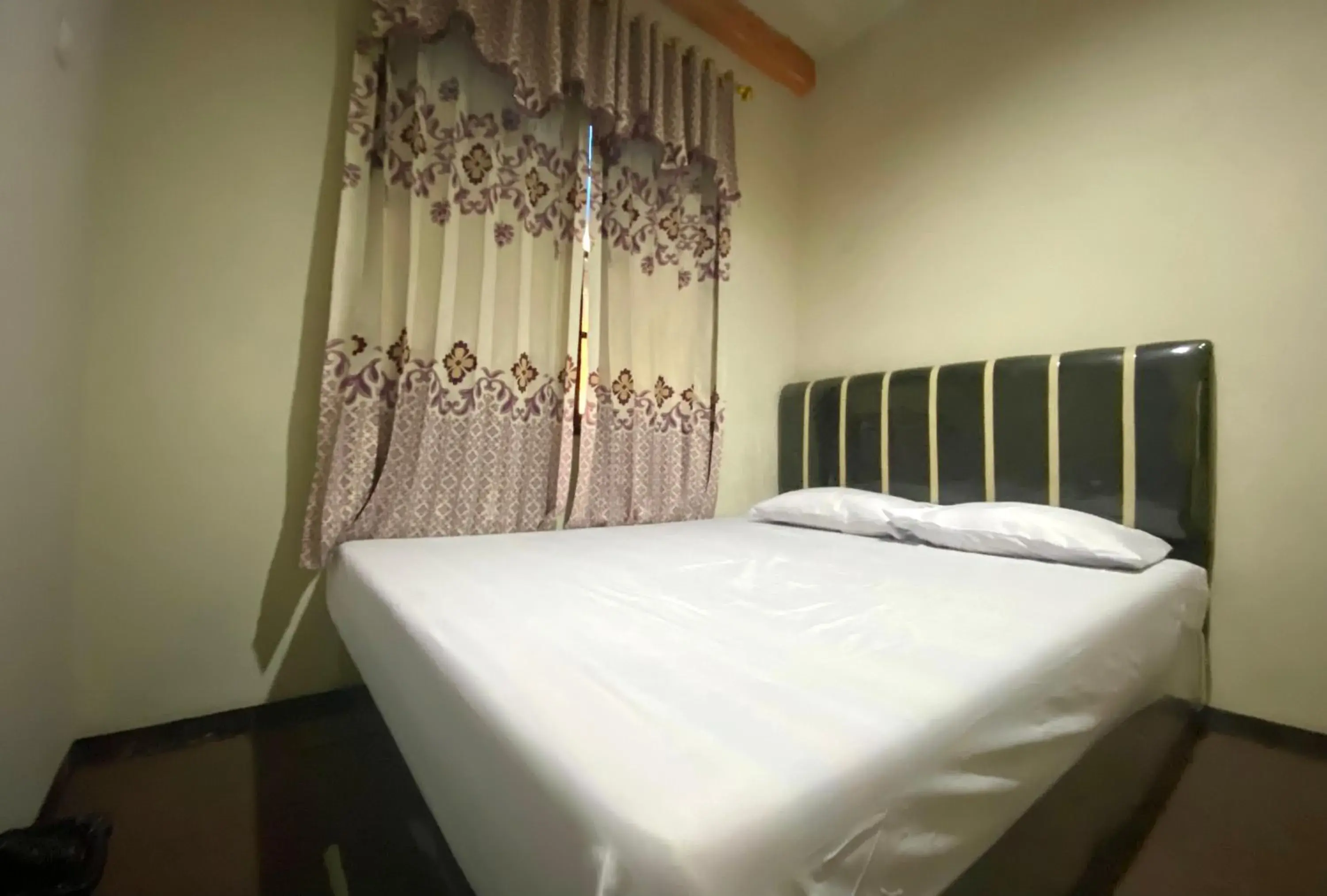 Bed in Homestay Srikandi Syariah Dieng RedPartner Bed in Homestay Srikandi Syariah Dieng RedPartner