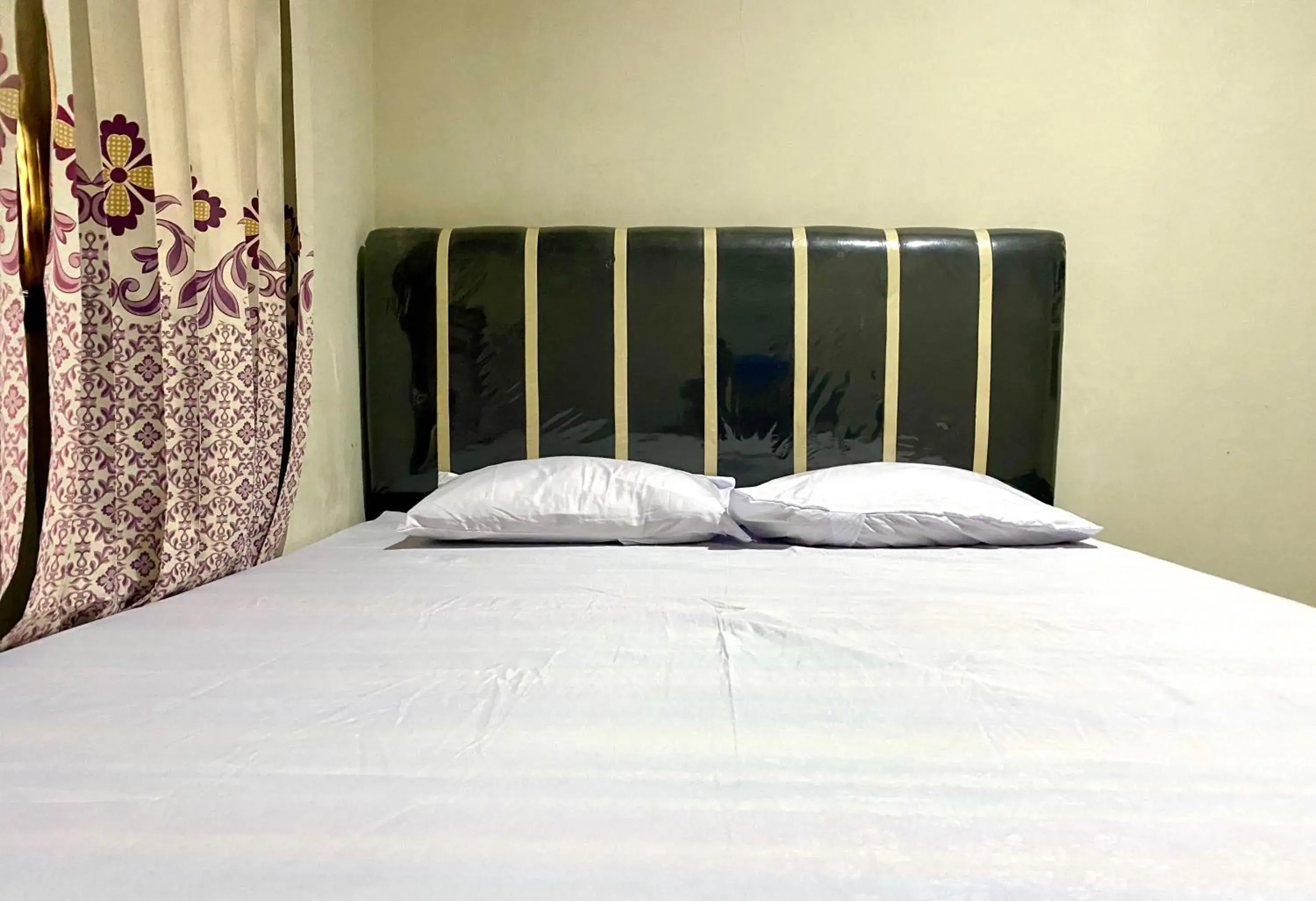 Bed in Homestay Srikandi Syariah Dieng RedPartner Bed in Homestay Srikandi Syariah Dieng RedPartner