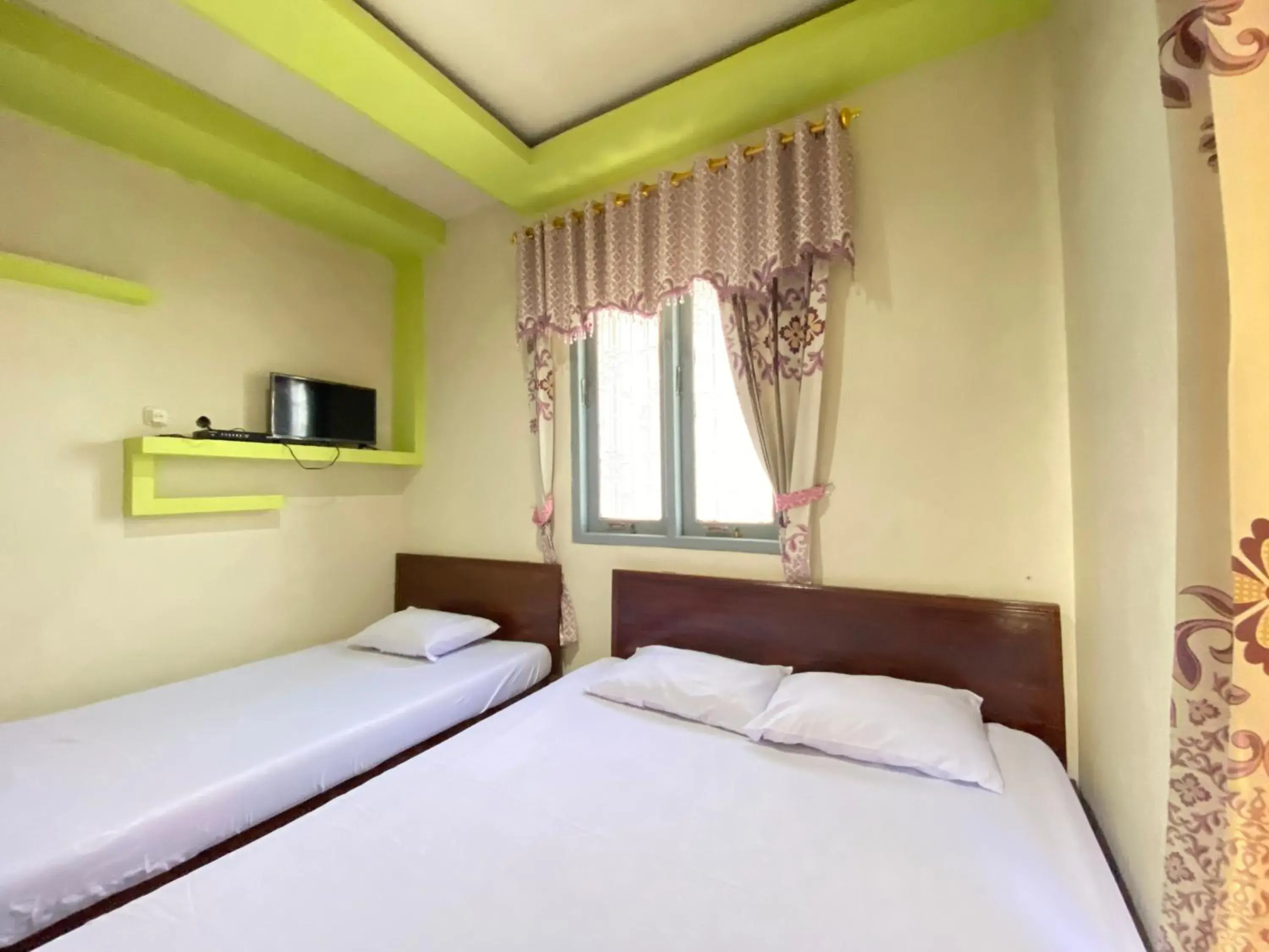 Bed in Homestay Srikandi Syariah Dieng RedPartner Bed in Homestay Srikandi Syariah Dieng RedPartner