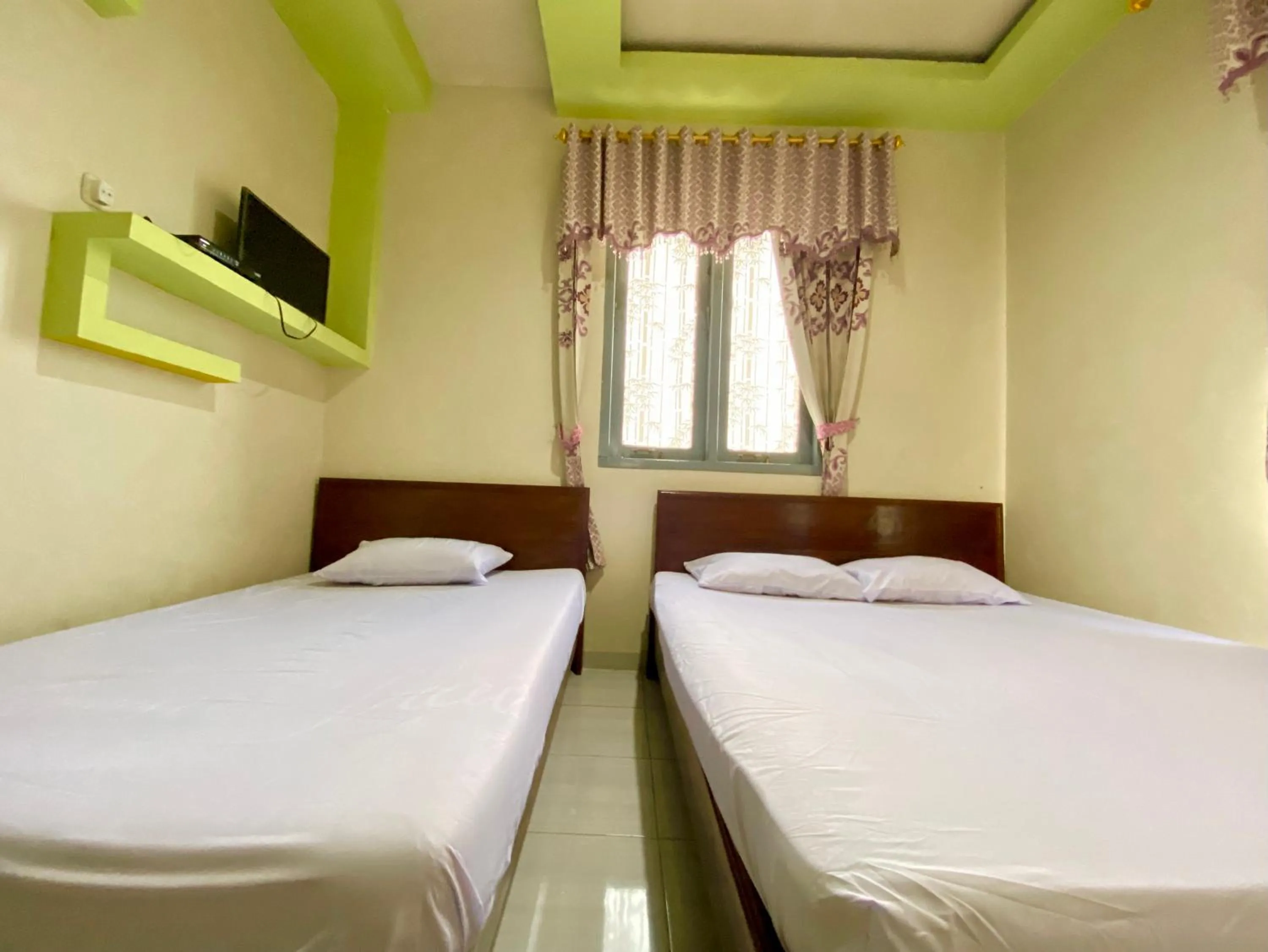 Bed in Homestay Srikandi Syariah Dieng RedPartner