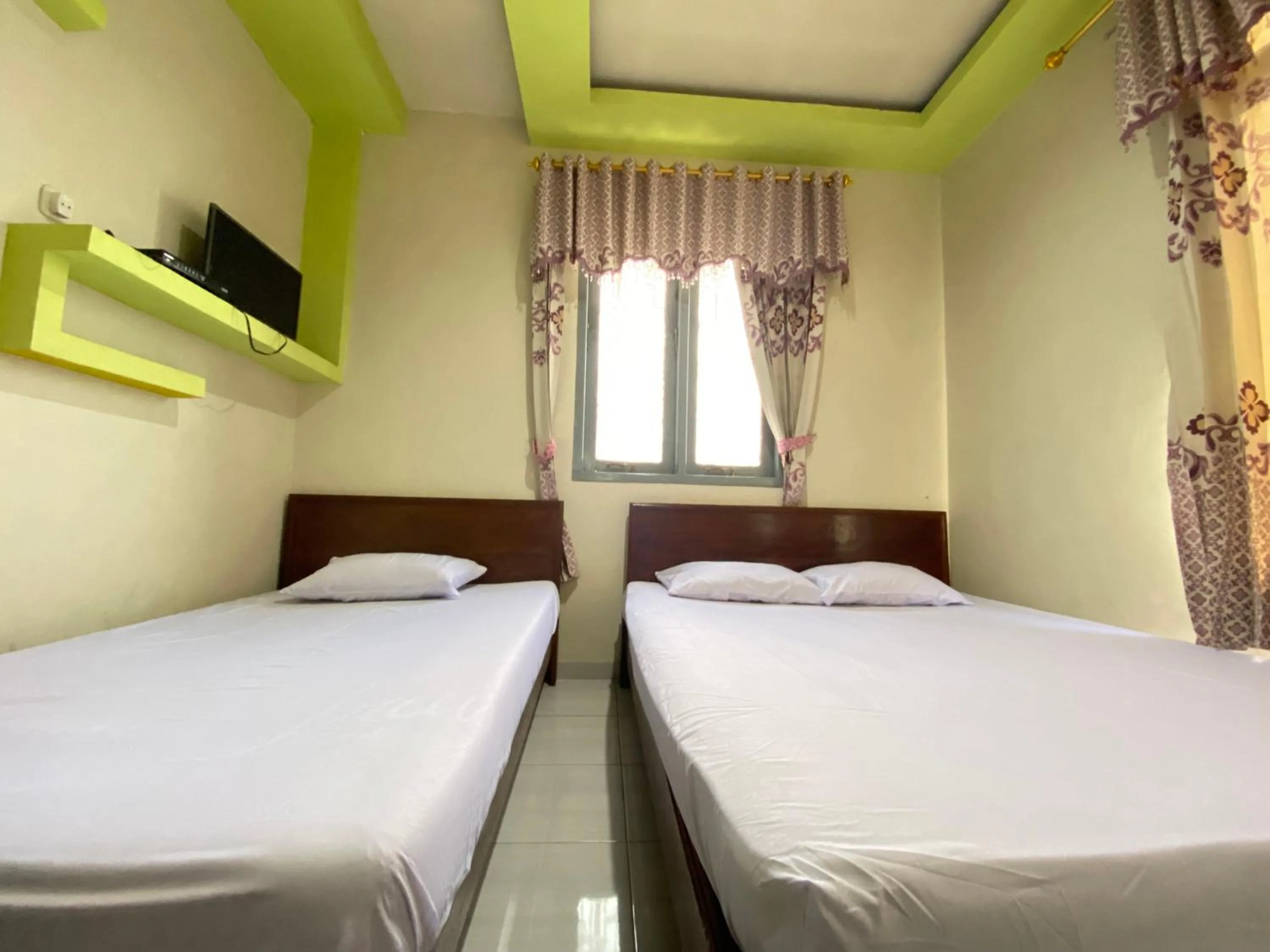 Bed in Homestay Srikandi Syariah Dieng RedPartner