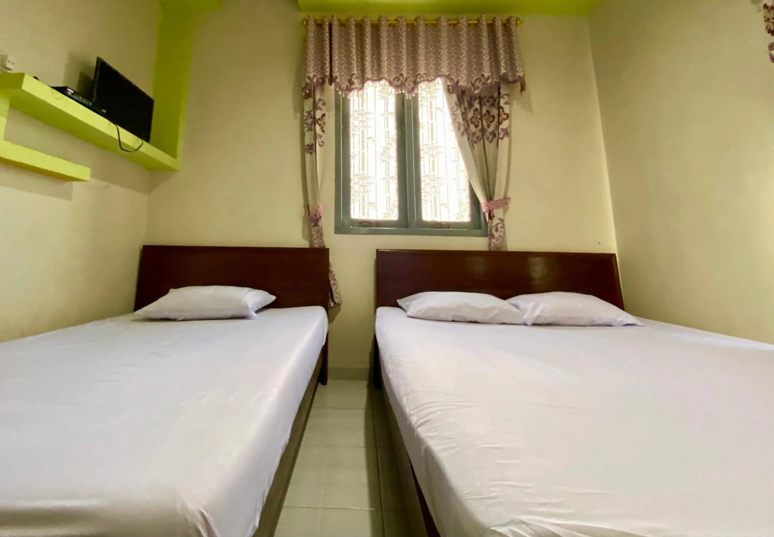 Bed in Homestay Srikandi Syariah Dieng RedPartner