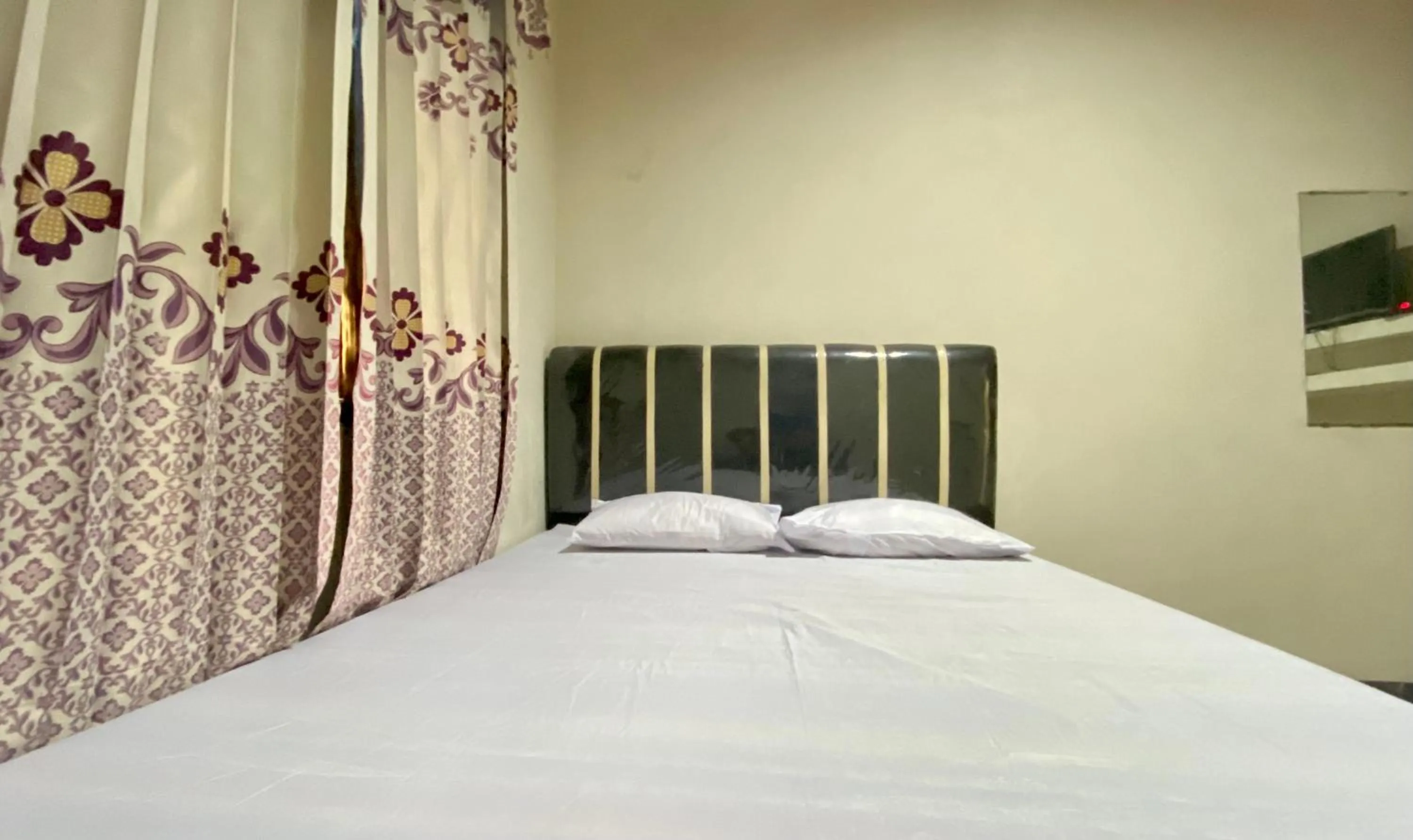 Bed in Homestay Srikandi Syariah Dieng RedPartner