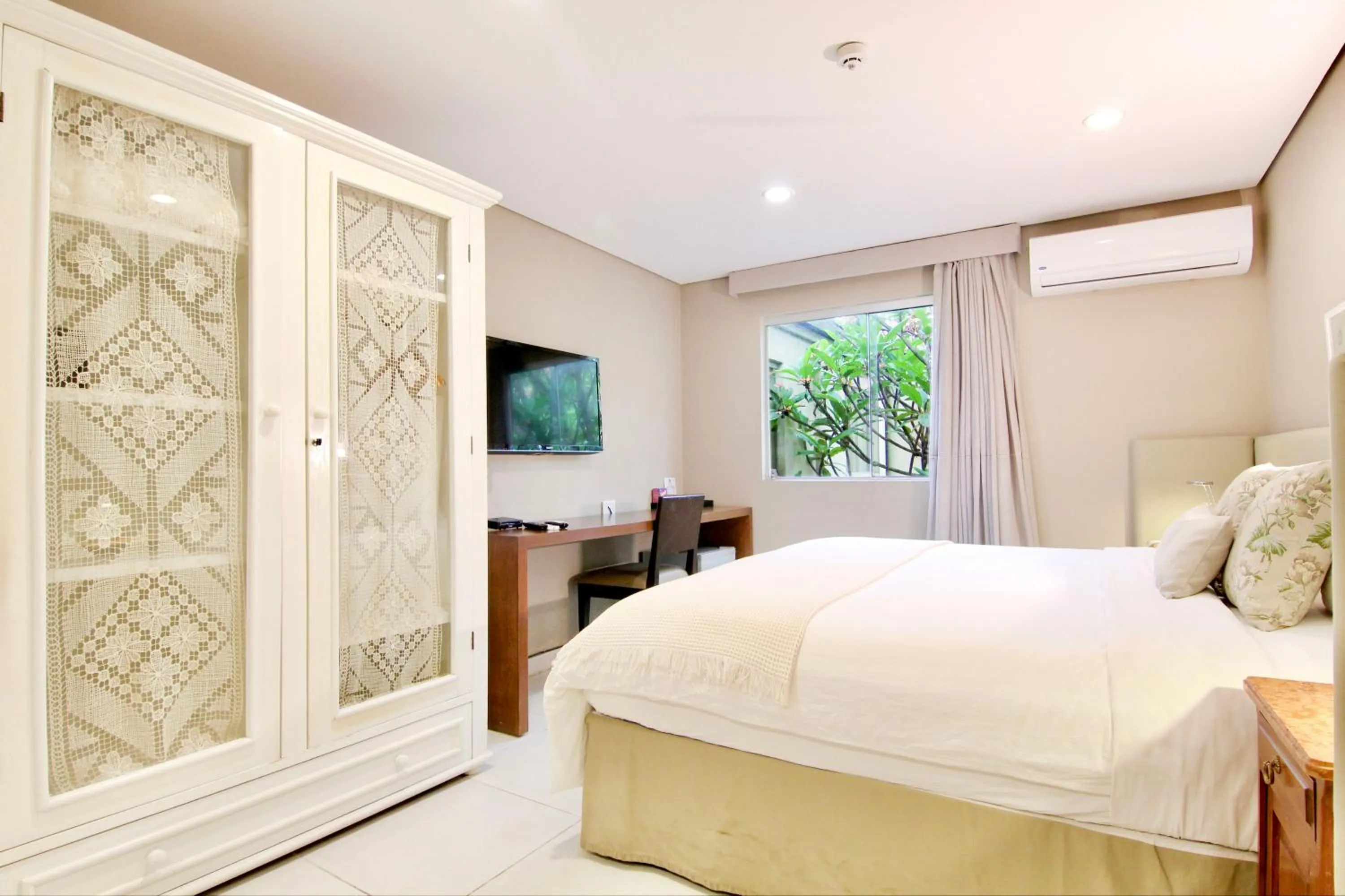 Bed in Faro Norte Suites