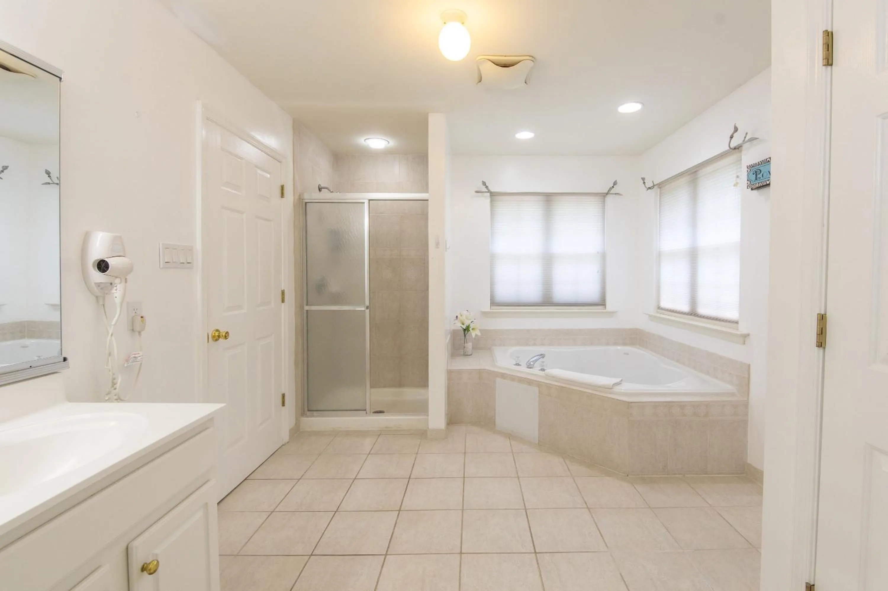 Shower in Luxury Villa with Hot Tub, Two Fire Pits, King Bed Suite, Game Room & Fenced Yard