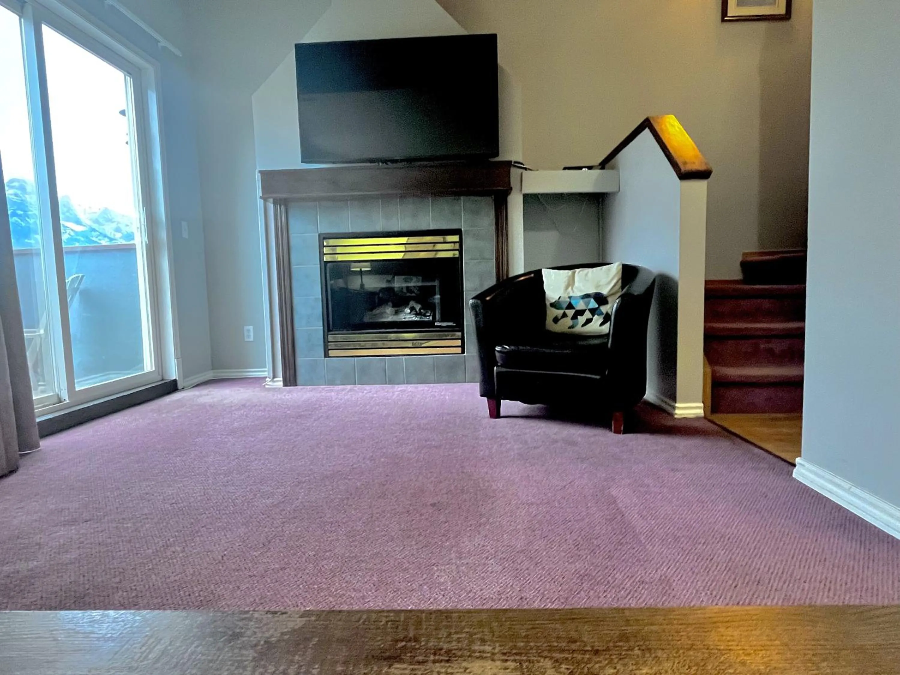 TV and multimedia in Canadian Rockies Chalets by Trilink - 2 & 3 Bedroom Condos - Self Check-In - Walking Distance to Downtown - Free Parking - Pet-Friendly - No AC