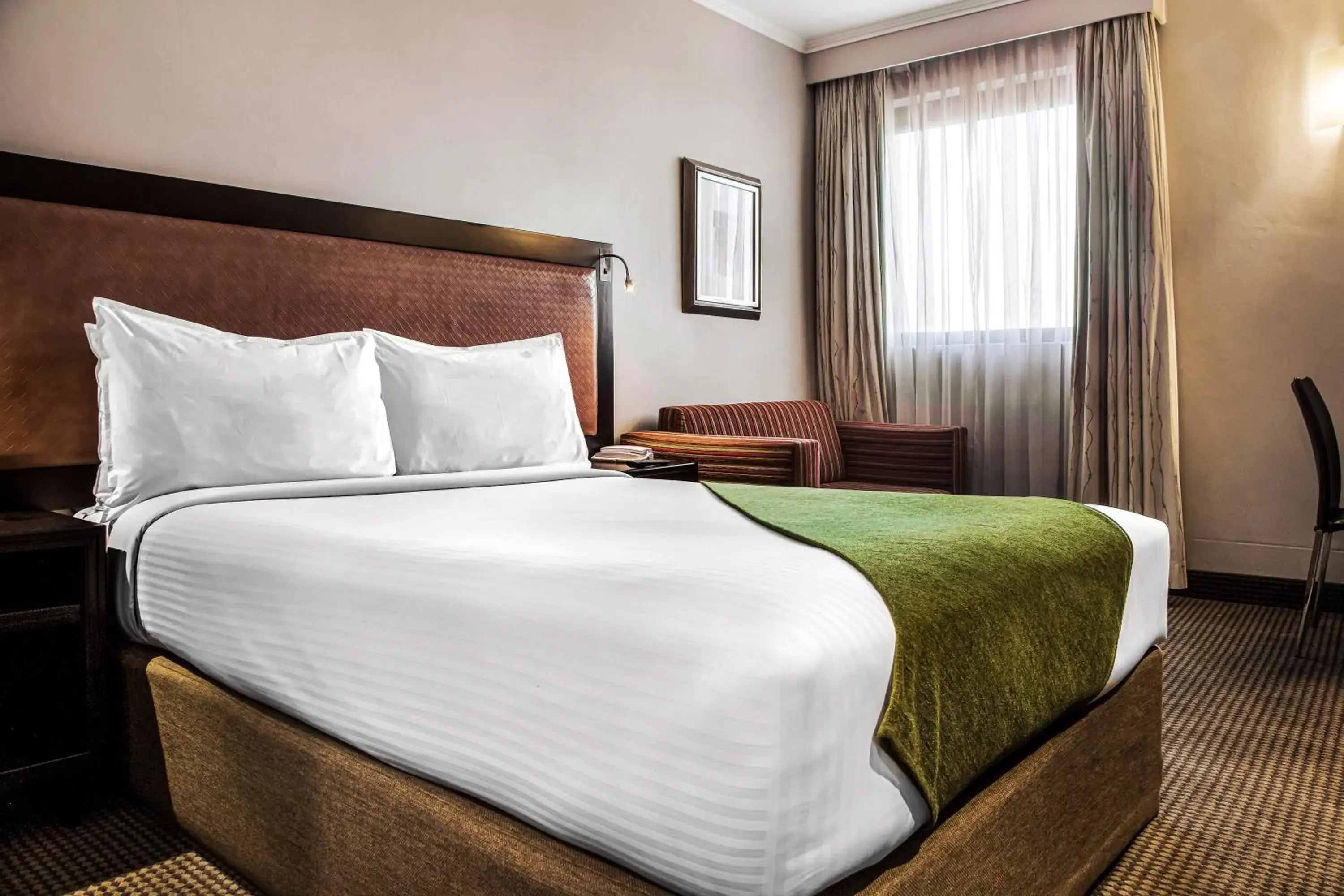 Bed in The RidgePoint Hotel Bed in The RidgePoint Hotel