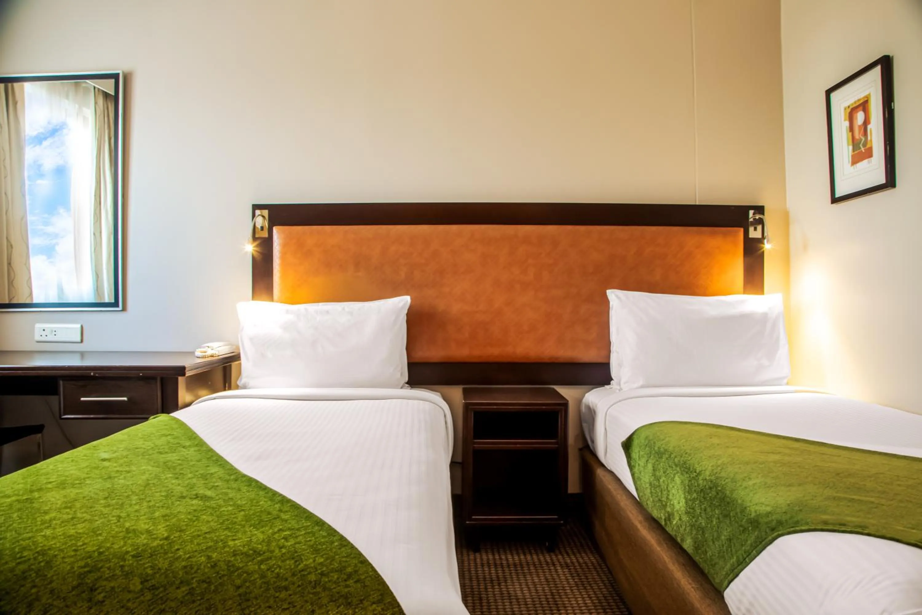 Bed in The RidgePoint Hotel