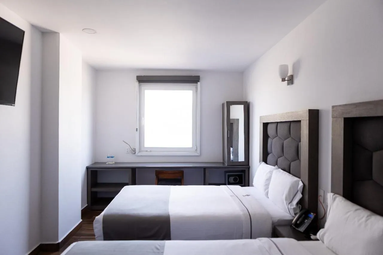 Bed in Hotel Bugari Aeropuerto Guadalajara