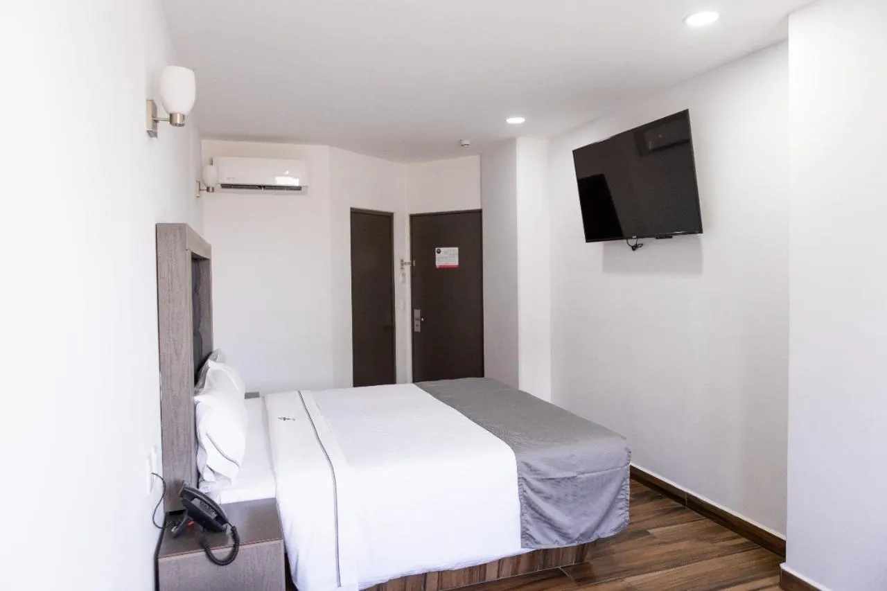 Bed in Hotel Bugari Aeropuerto Guadalajara