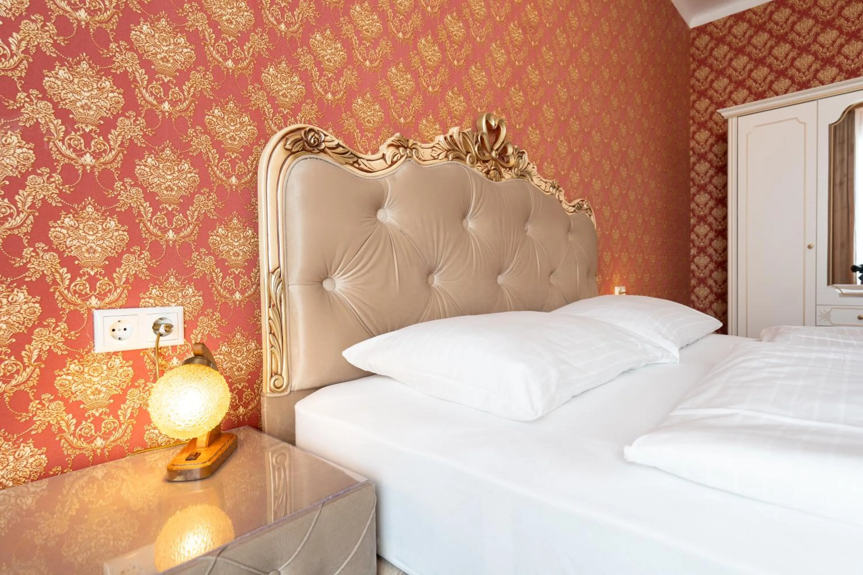 Bed in Hotel Urania