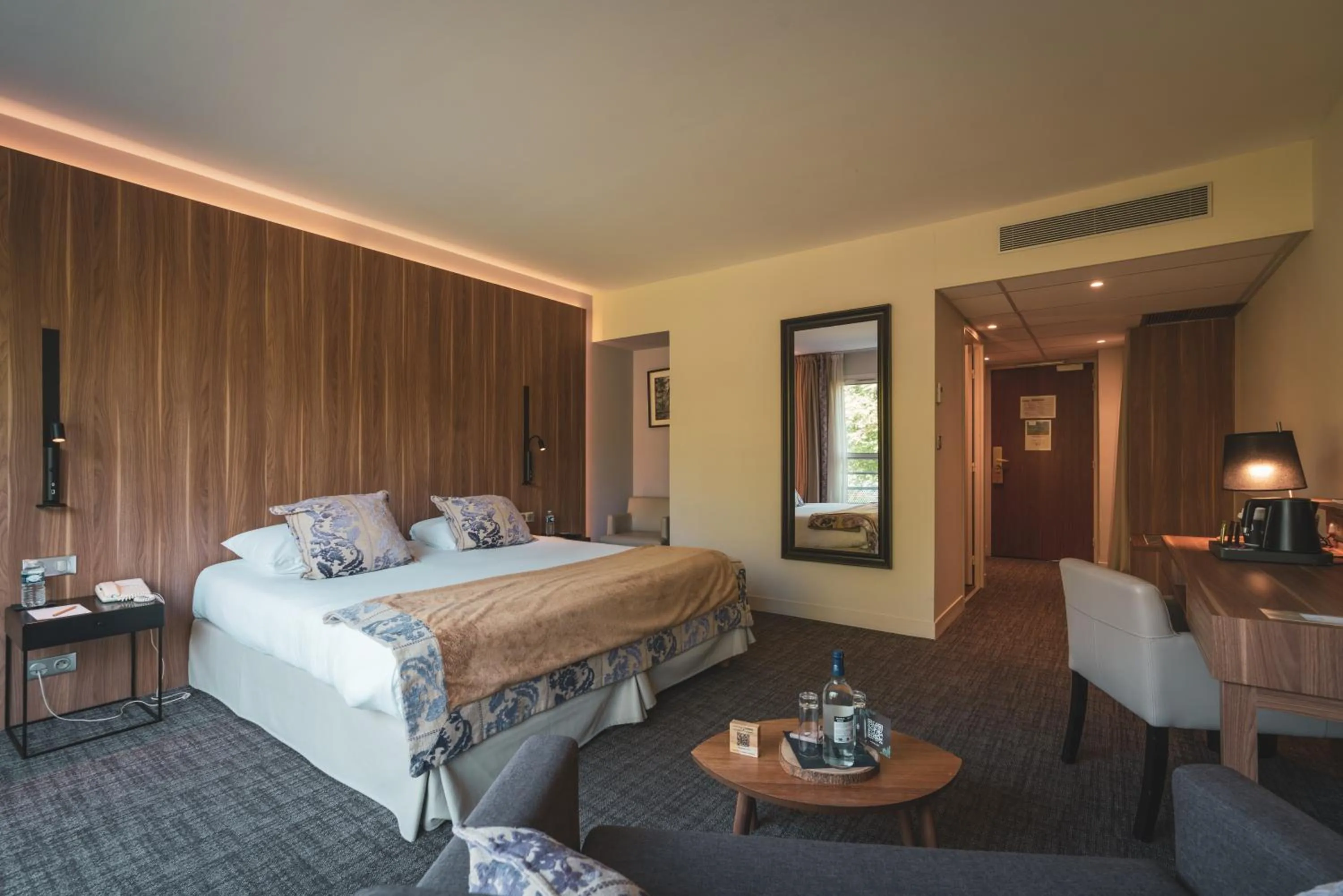 Bed in Le Forges Hotel