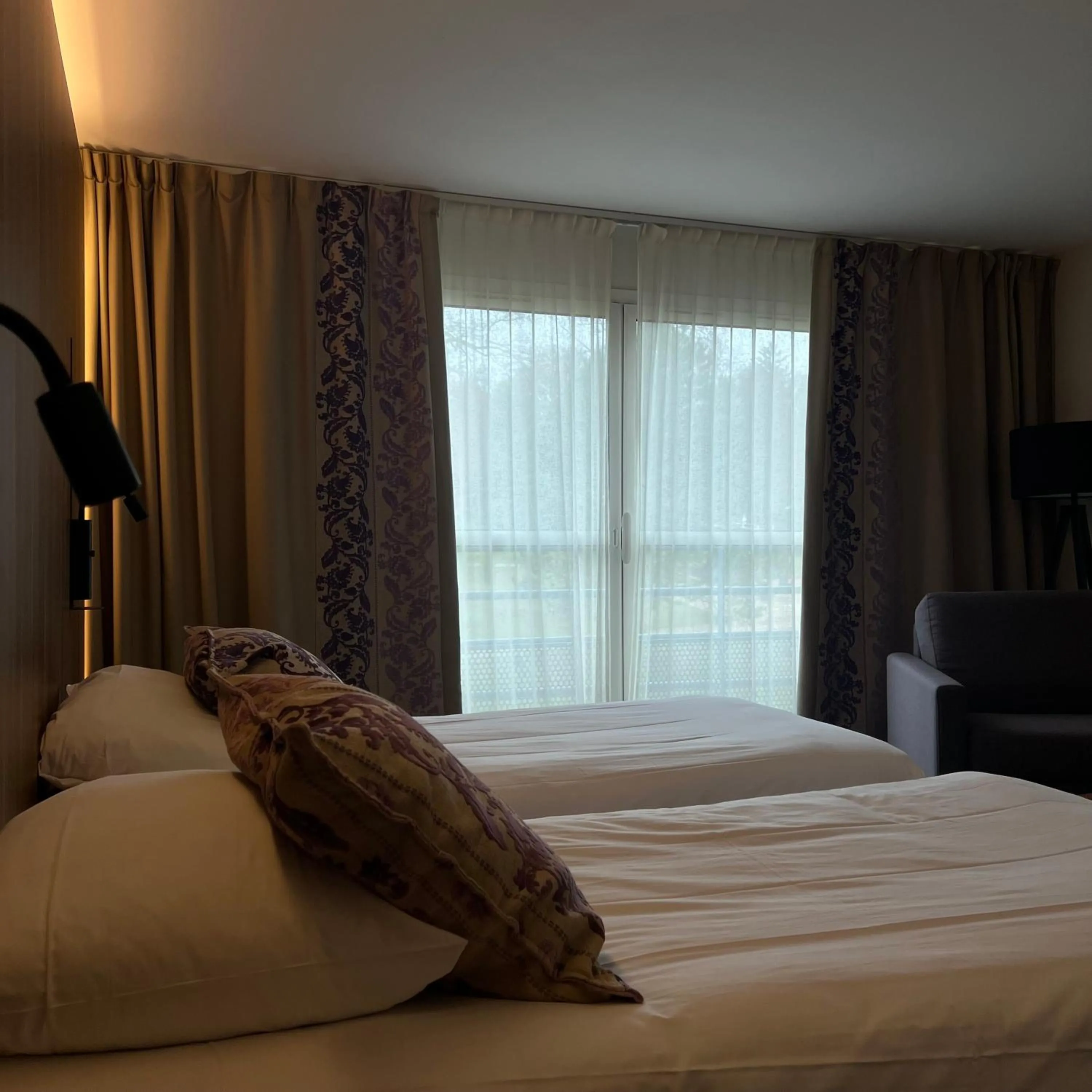 Bed in Le Forges Hotel