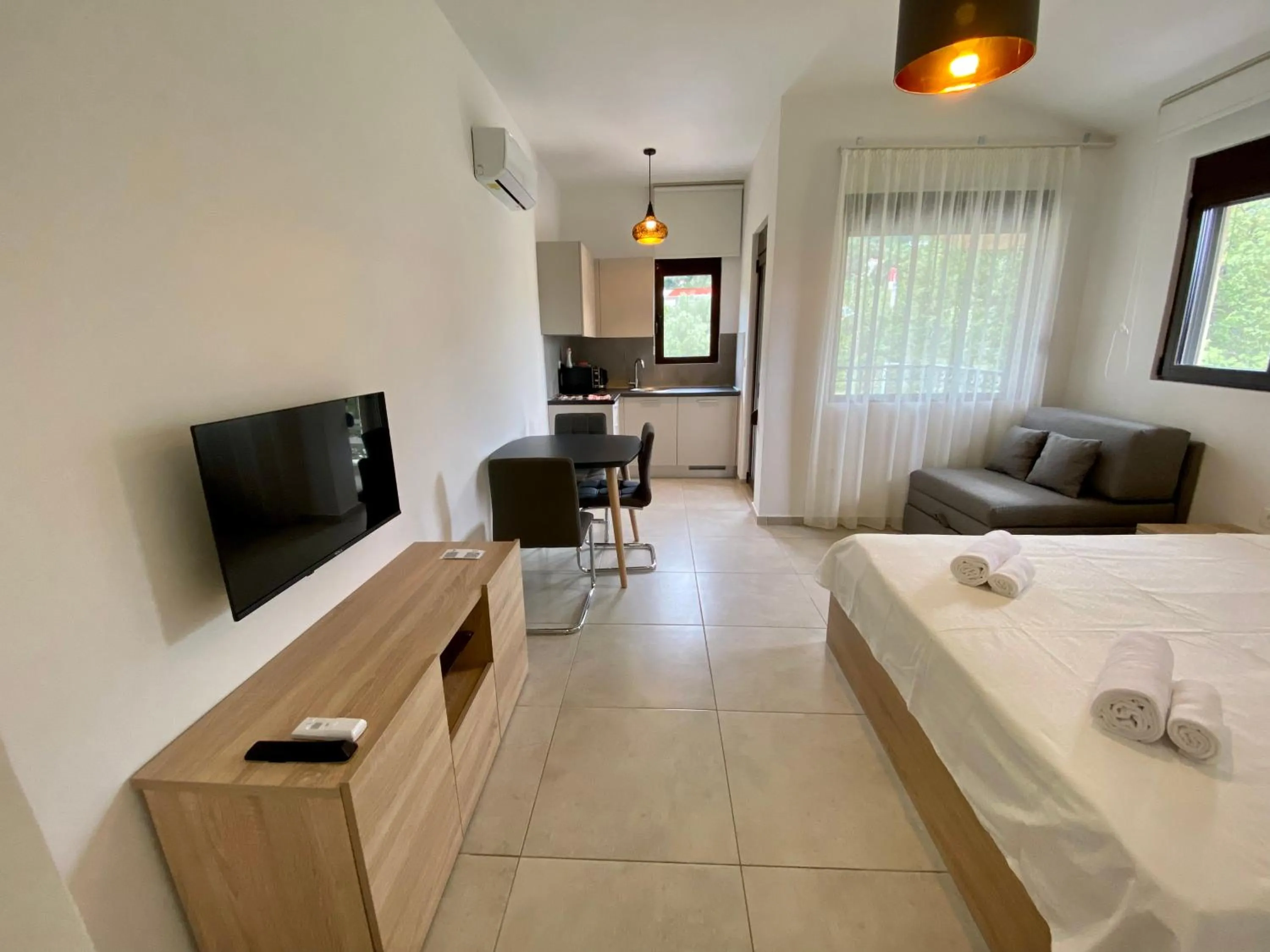 Living room, Bed in Villa Dolphin Apartments