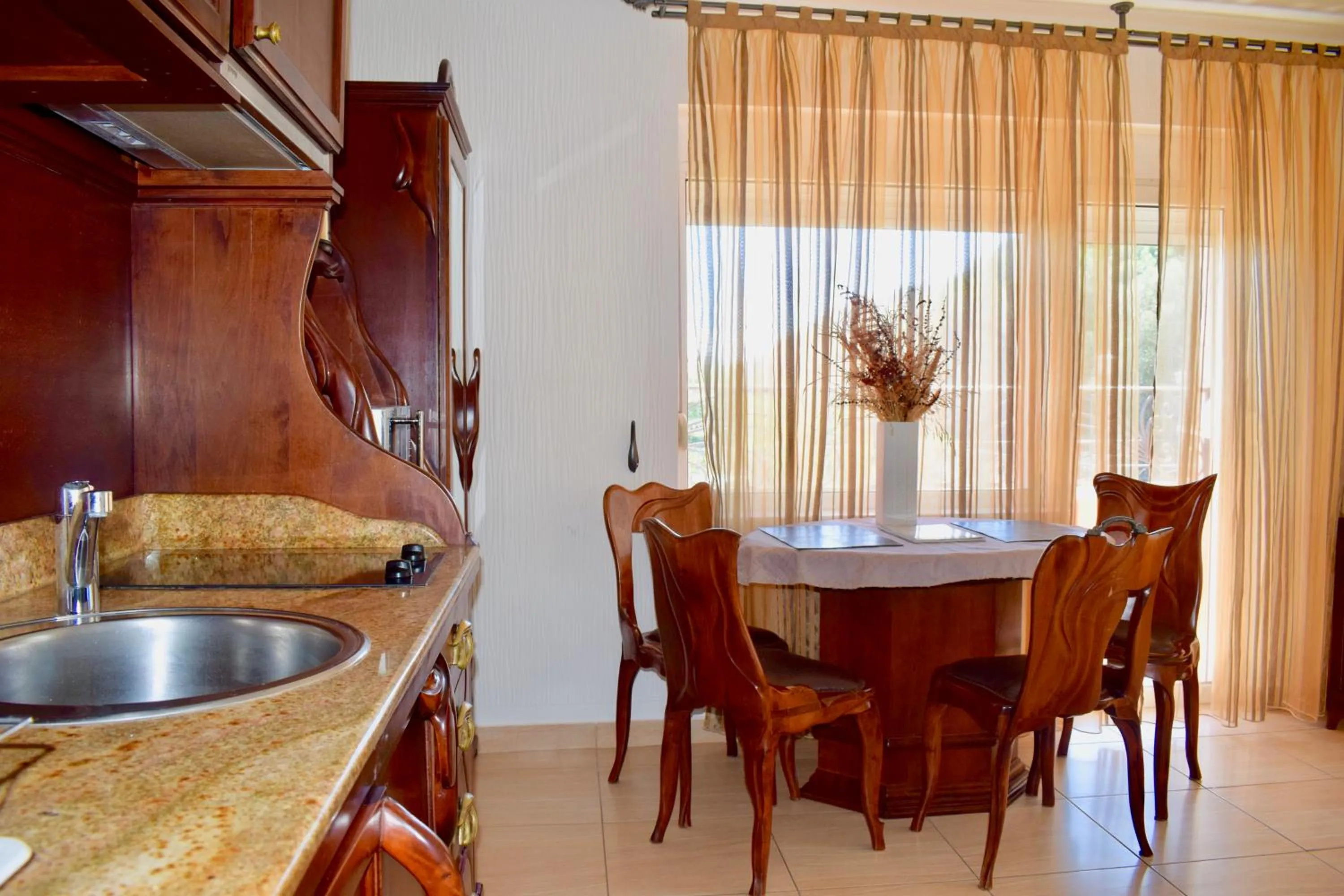 Kitchen or kitchenette in Villa Dolphin Apartments