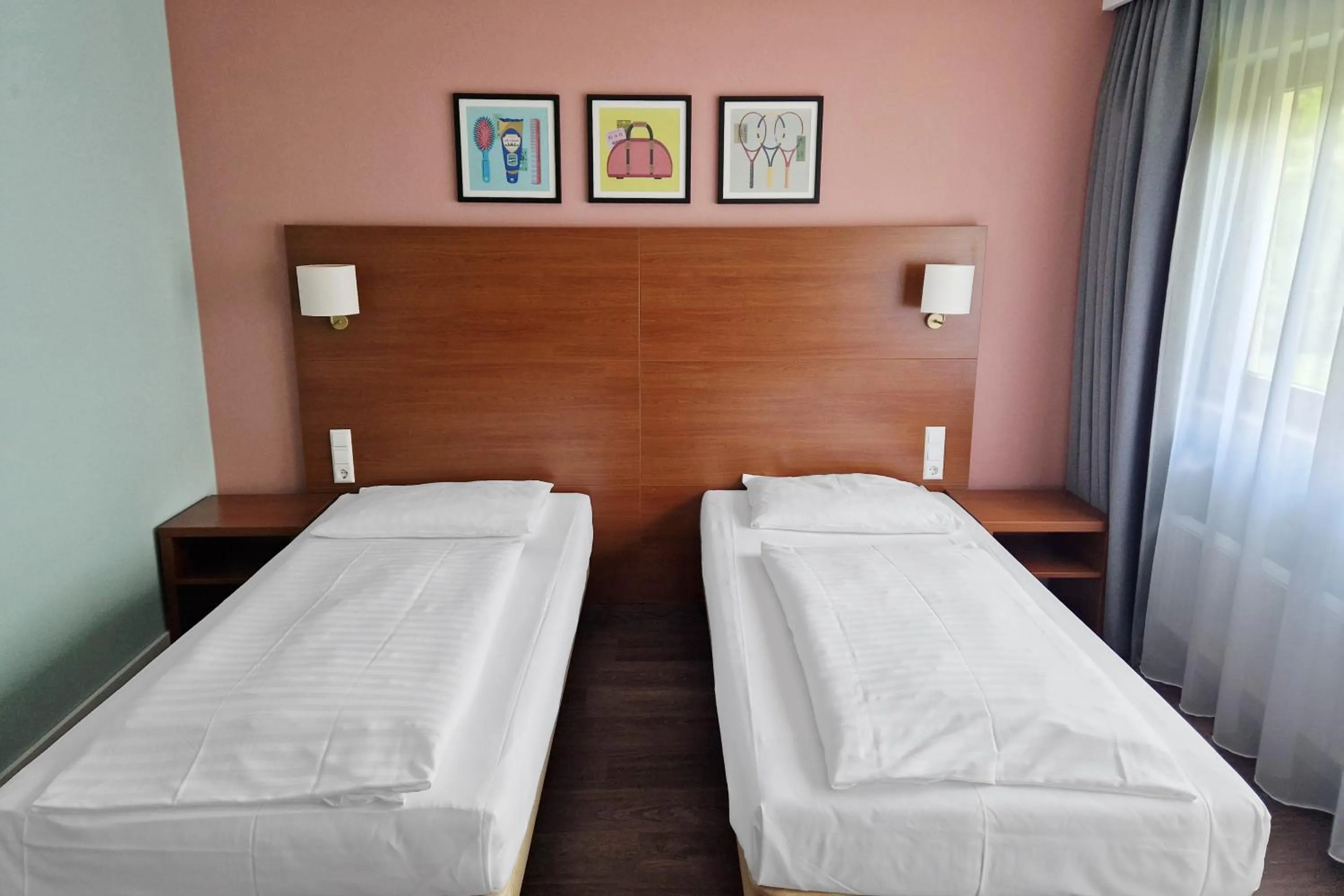 Bed in Hotel Rega Stuttgart