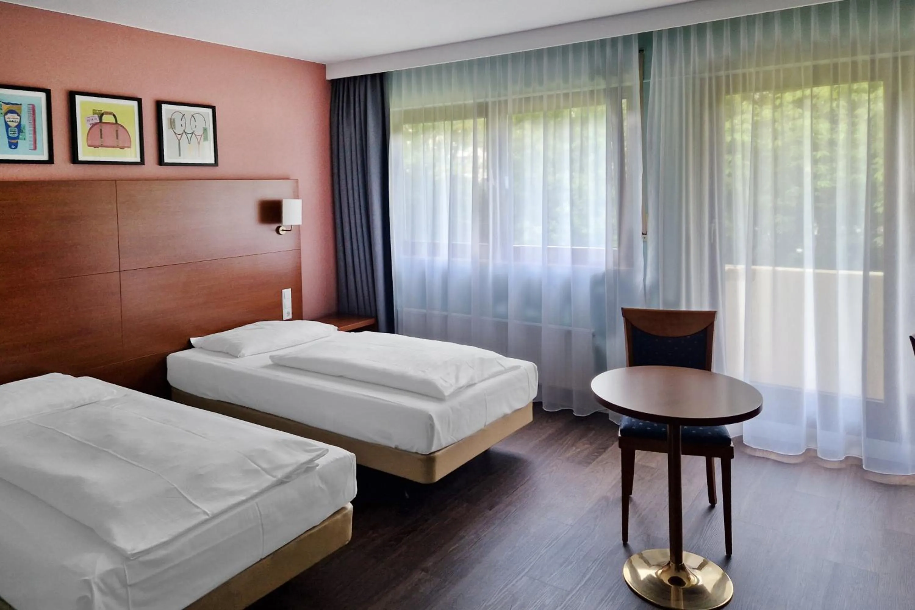 Photo of the whole room, Bed in Hotel Rega Stuttgart