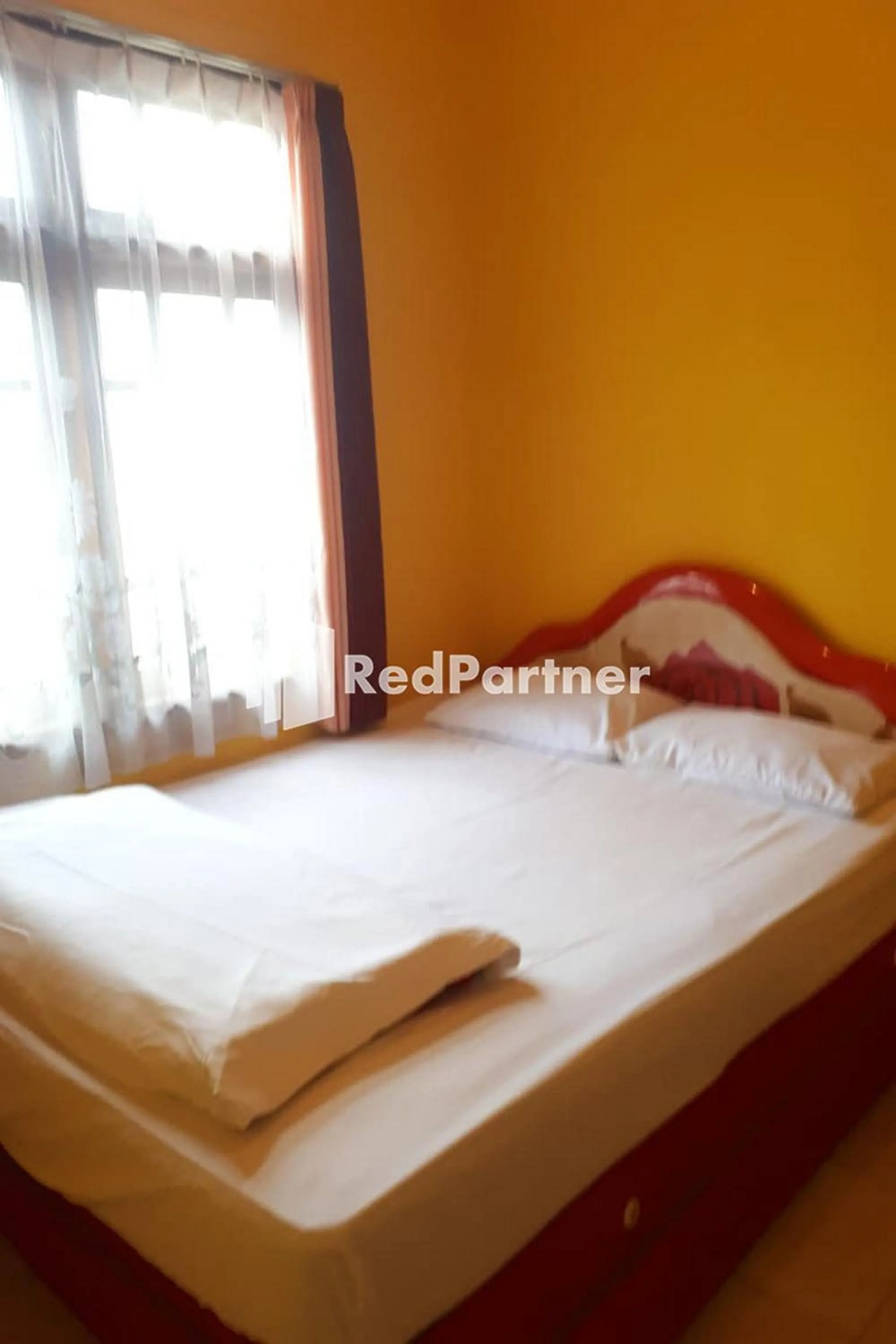 Bed in Bromo Indah Lestari Homestay Mitra RedDoorz