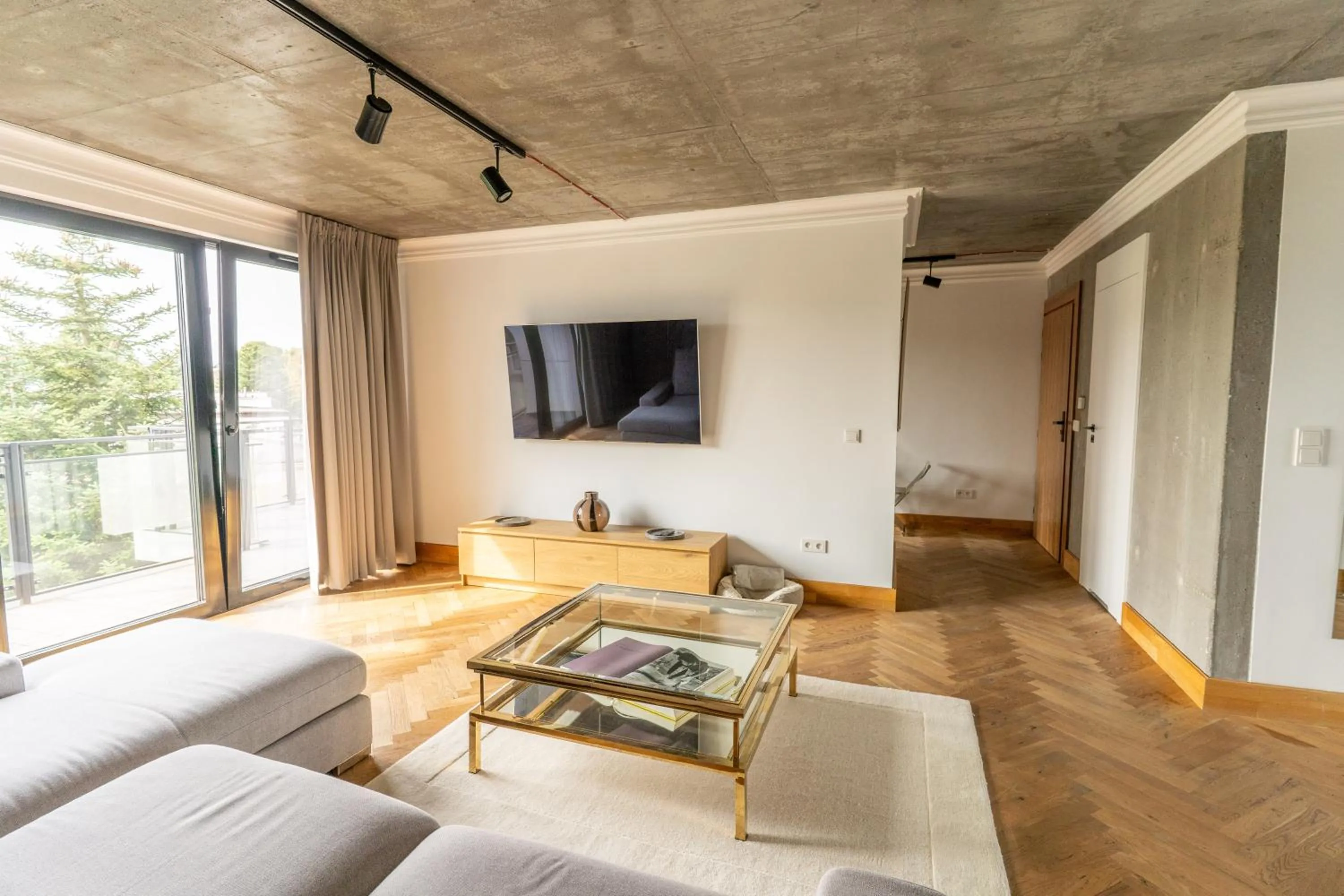 Communal lounge/ TV room in Apartamenty Przystanek Przy Klifie